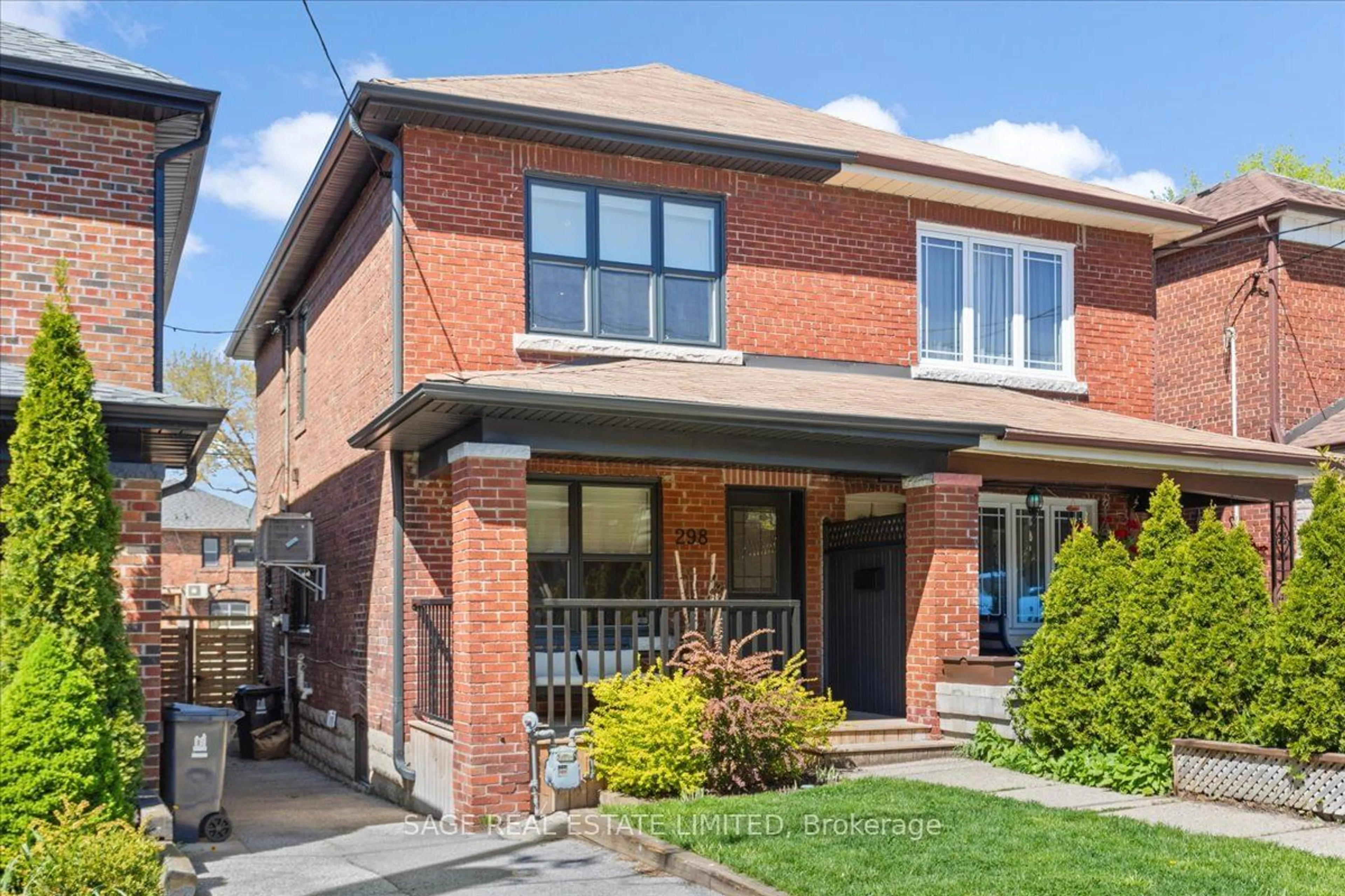 Home with brick exterior material for 298 Arlington Ave, Toronto Ontario M6C 2Z7