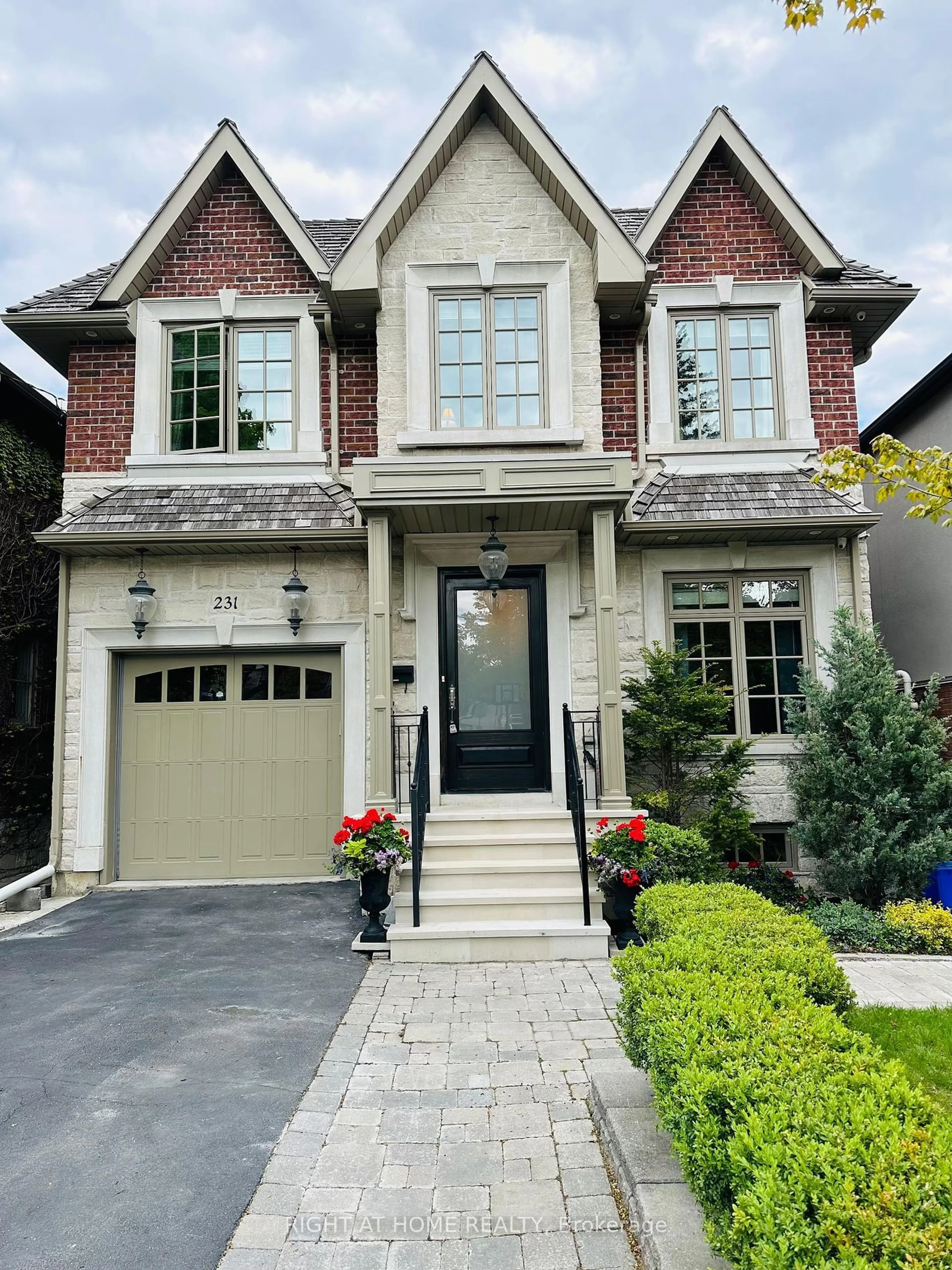 Home with brick exterior material for 231 Hanna Rd, Toronto Ontario M4G 3P3