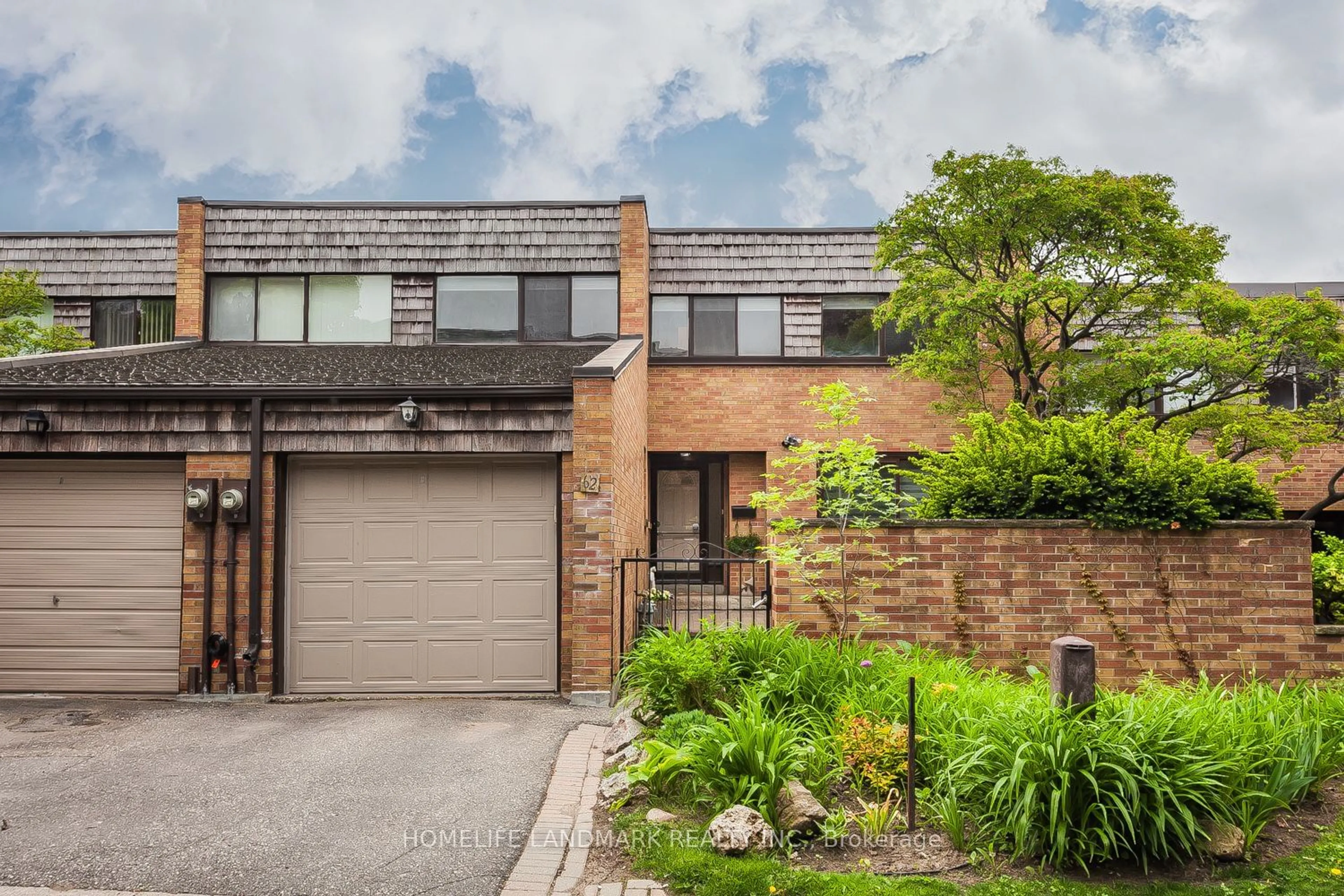Home with brick exterior material for 62 Carl Shepway Way, Toronto Ontario M2J 1X4