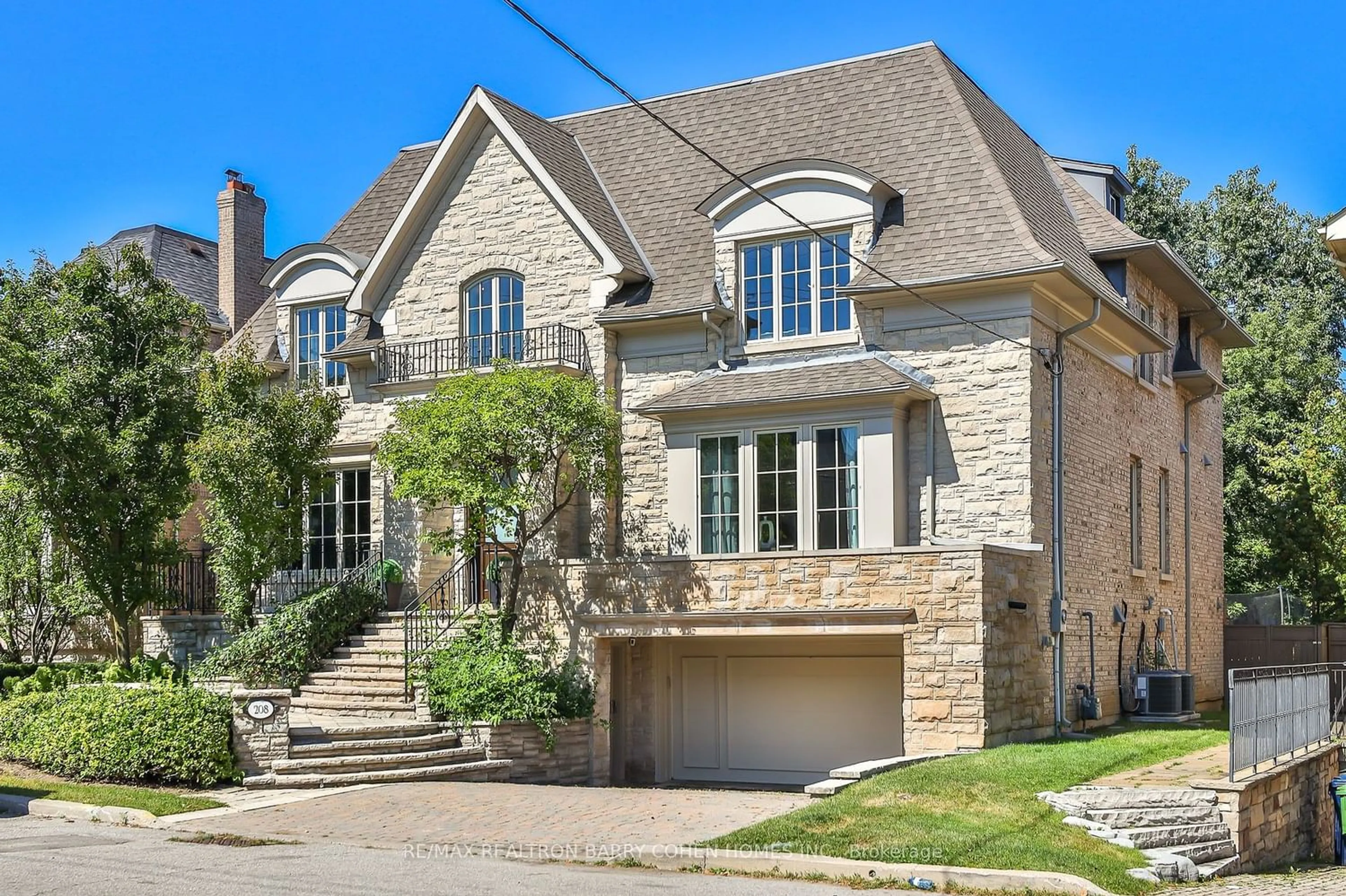 Home with brick exterior material for 208 Carmichael Ave, Toronto Ontario M5M 2X3