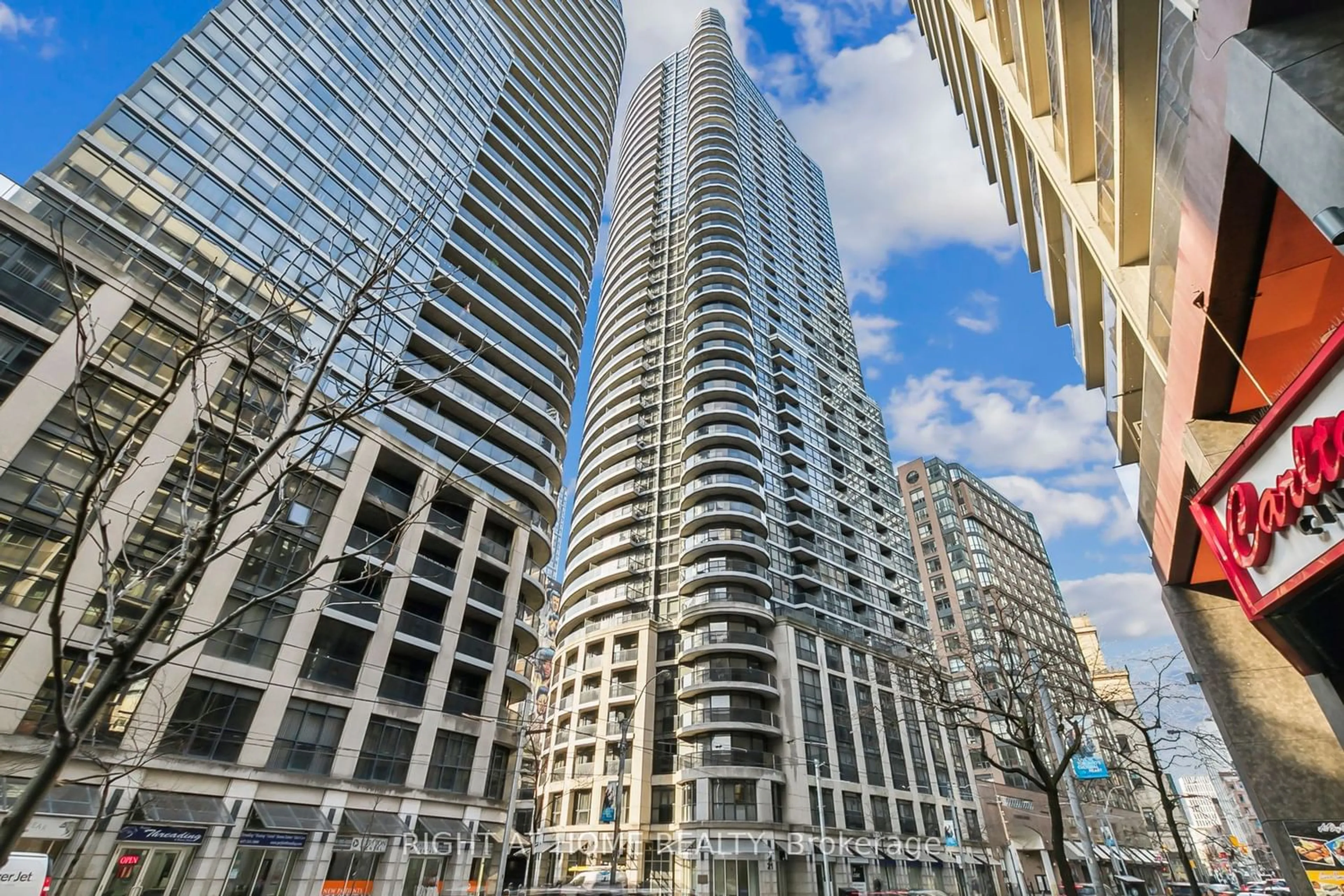 A pic from exterior of the house or condo for 21 Carlton St #707, Toronto Ontario M5B 1L3