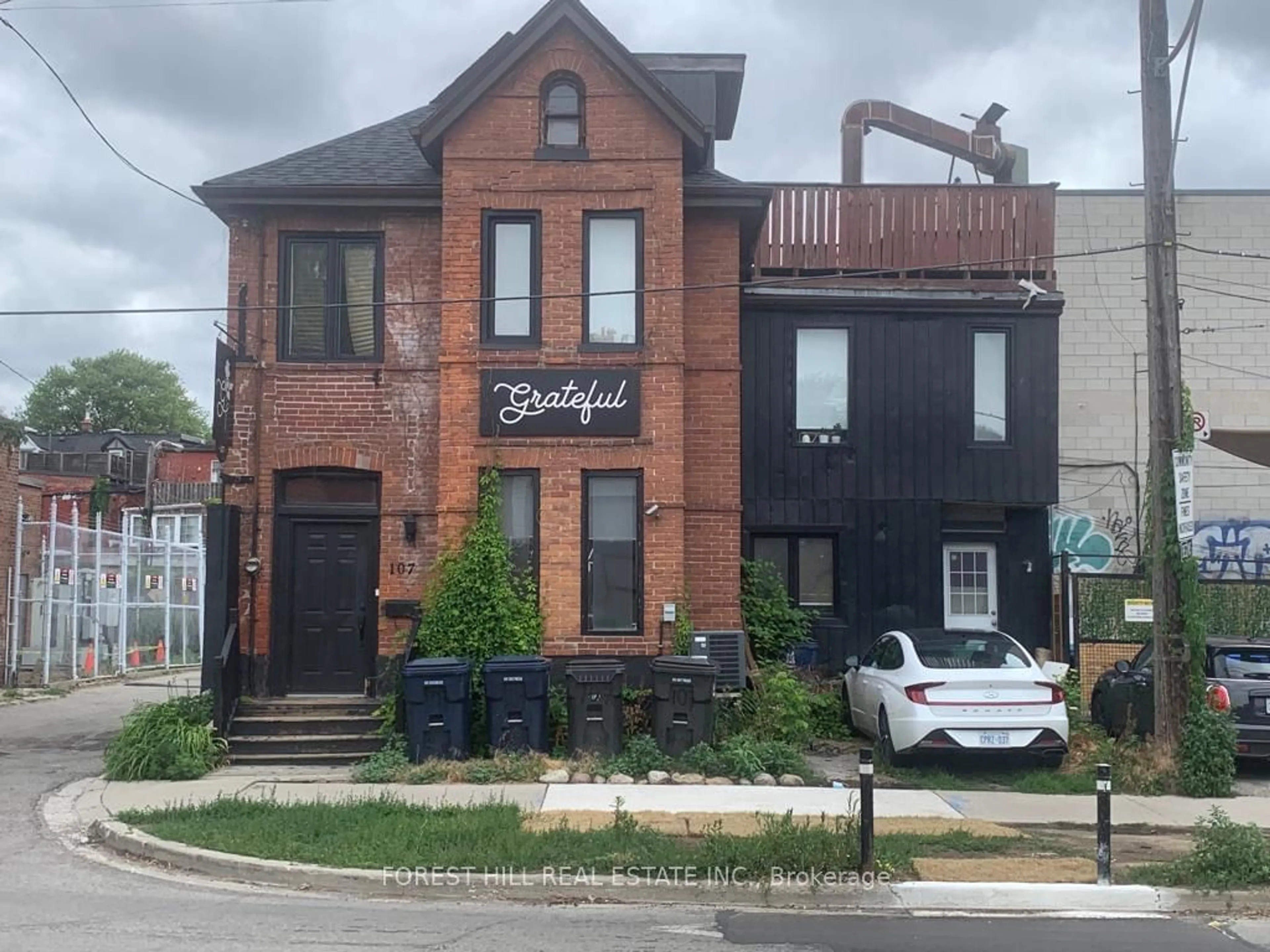 Home with brick exterior material for 107 Shaw St, Toronto Ontario M6J 2W4