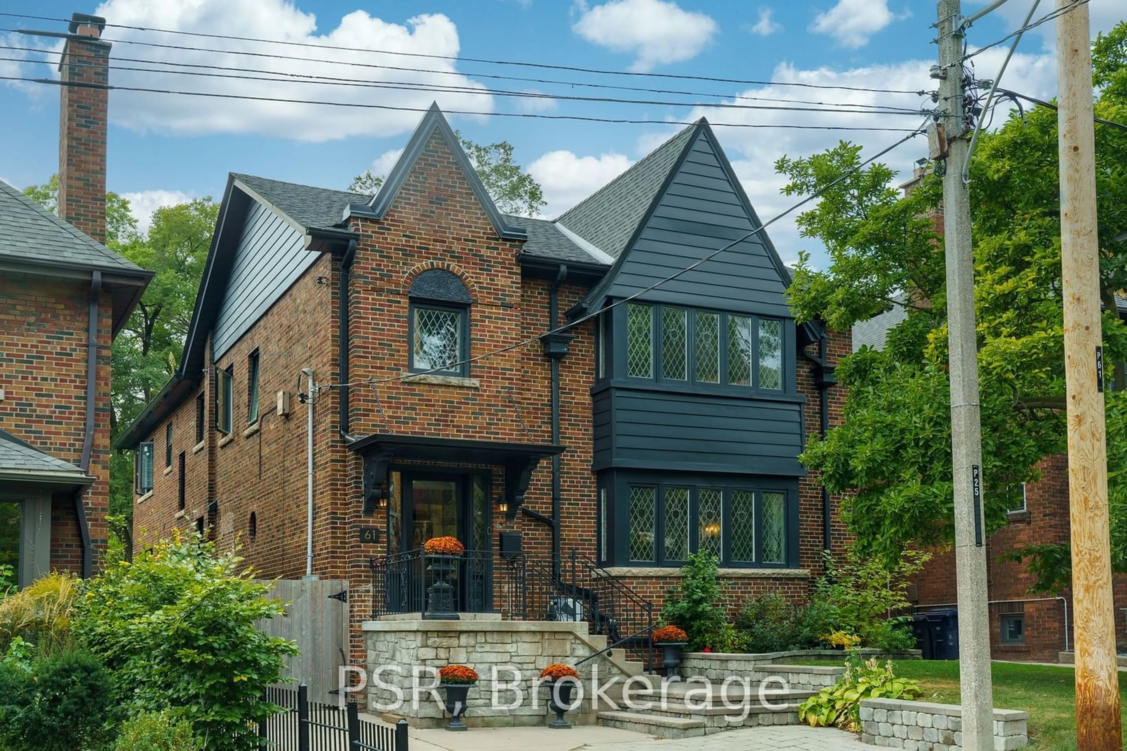Home with brick exterior material for 61 Burnside Dr, Toronto Ontario M6G 2M9