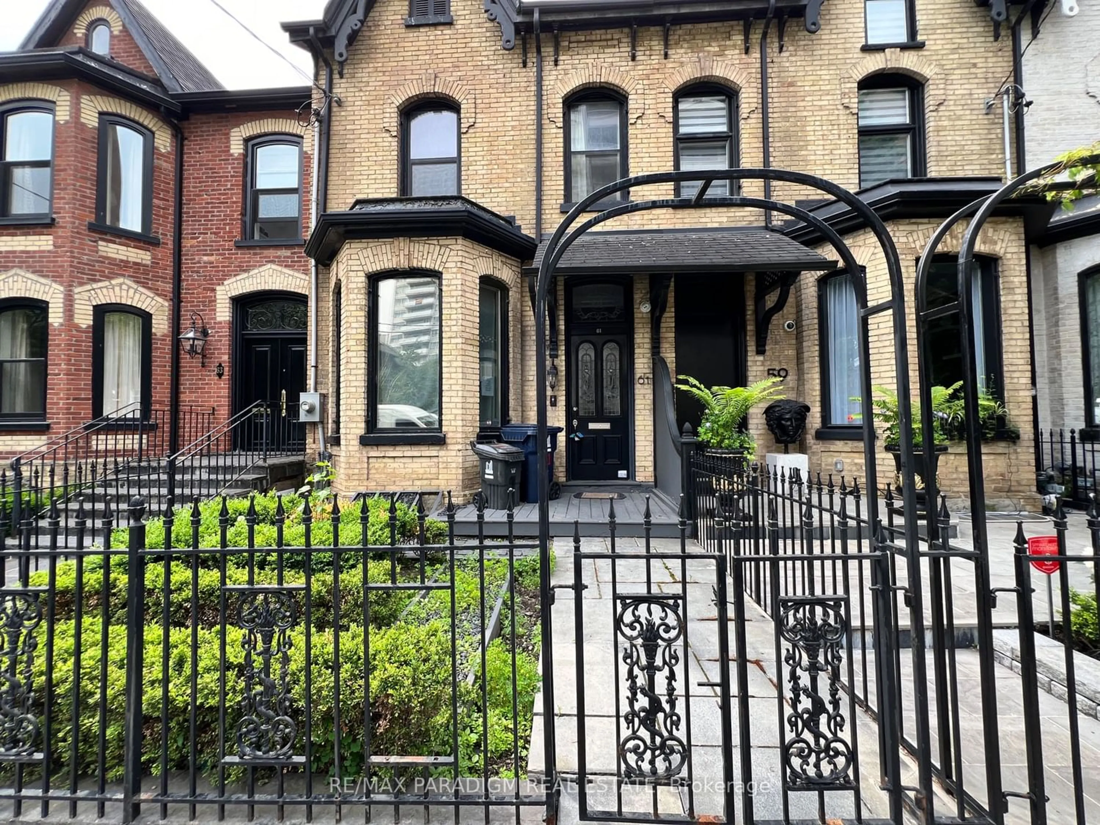 Home with brick exterior material for 61 Gloucester St, Toronto Ontario M4Y 1L8