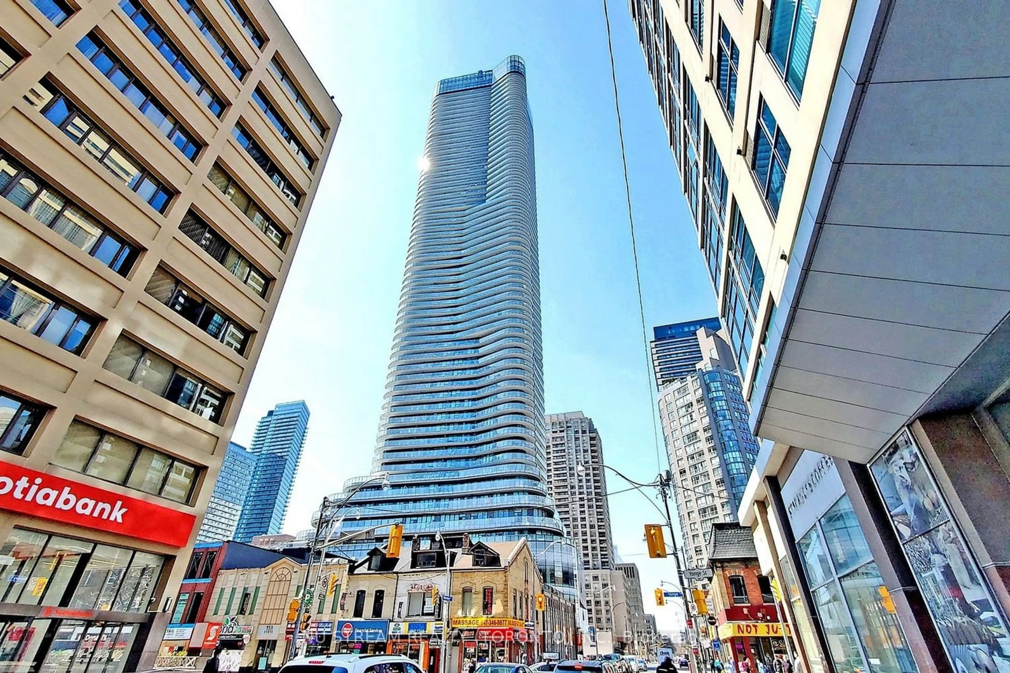 A pic from exterior of the house or condo for 11 Wellesley St #5704, Toronto Ontario M4Y 0G4