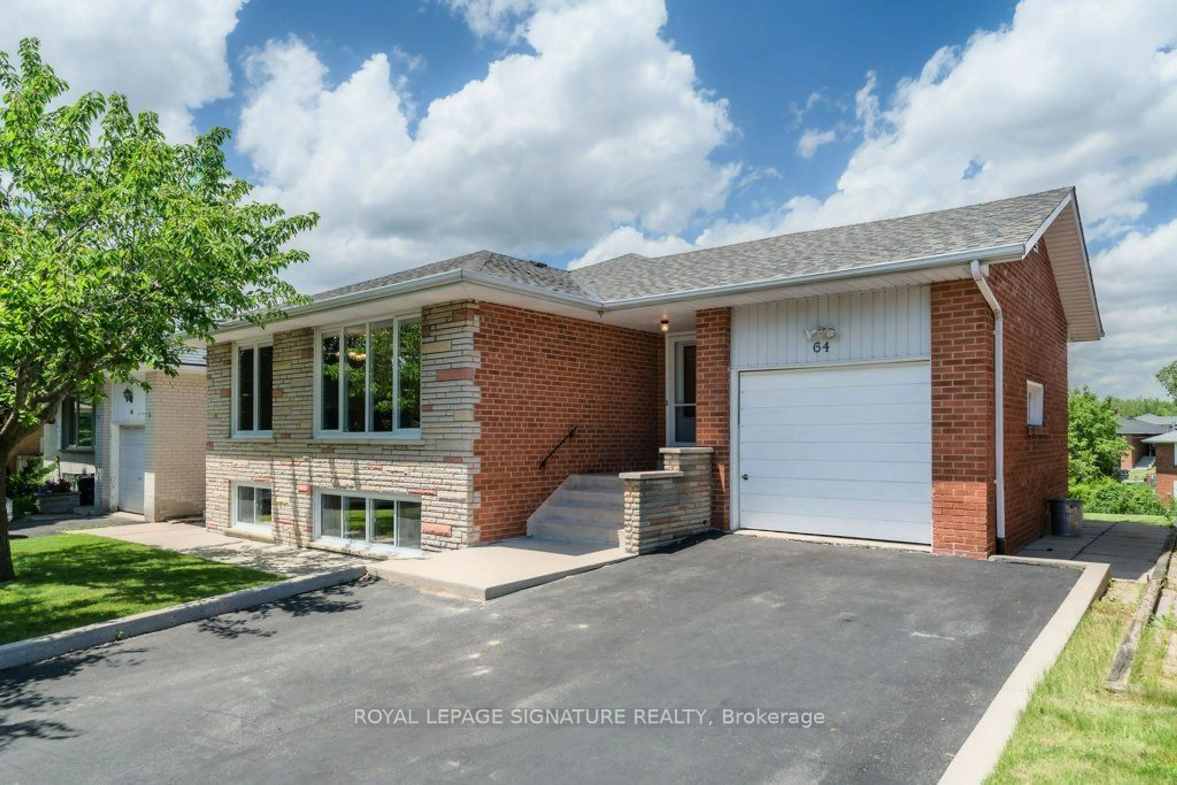 Home with brick exterior material for 64 RUSCICA Dr, Toronto Ontario M4A 1R4