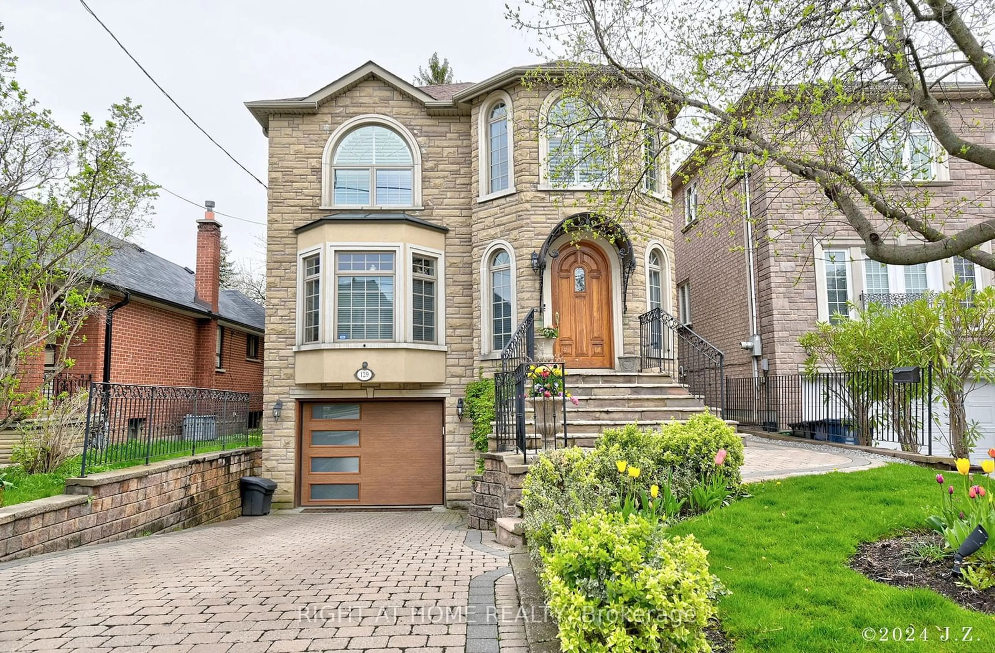 Home with brick exterior material for 129 Glen Park Ave, Toronto Ontario M6B 2C6