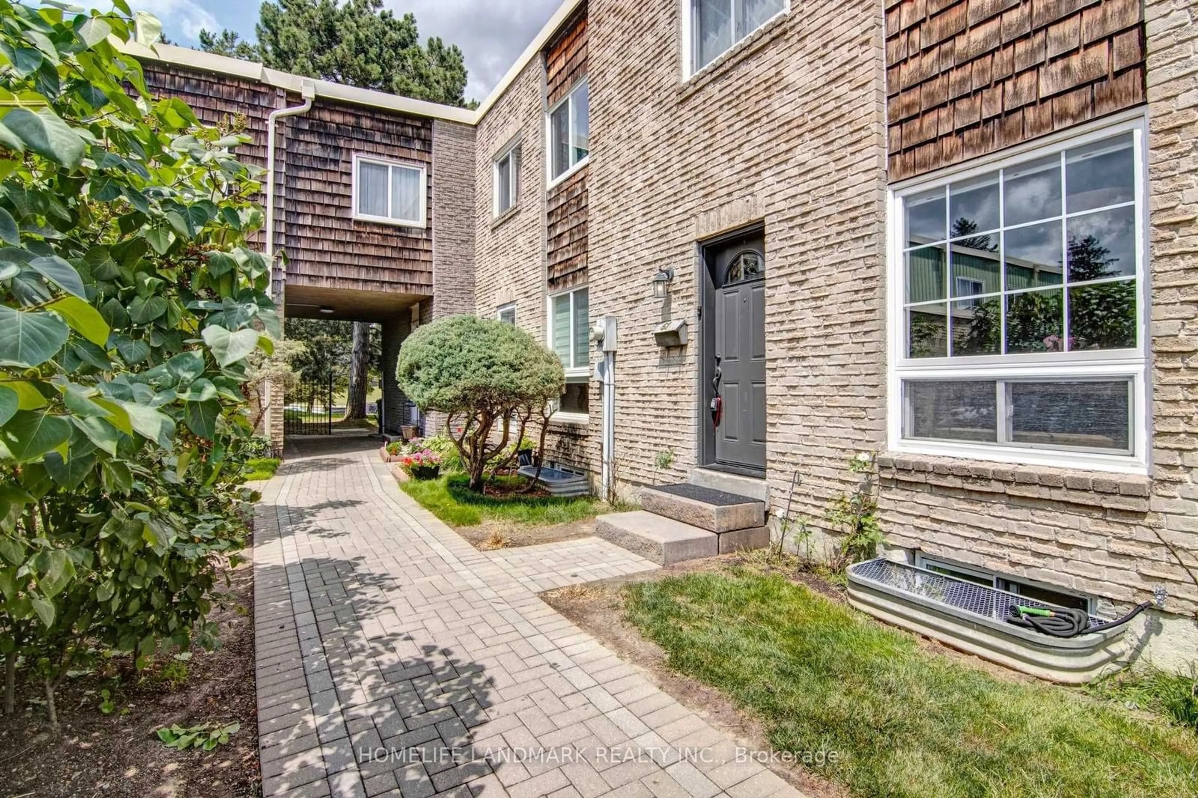 Home with brick exterior material for 61 Woody Vine Way, Toronto Ontario M2J 4H5