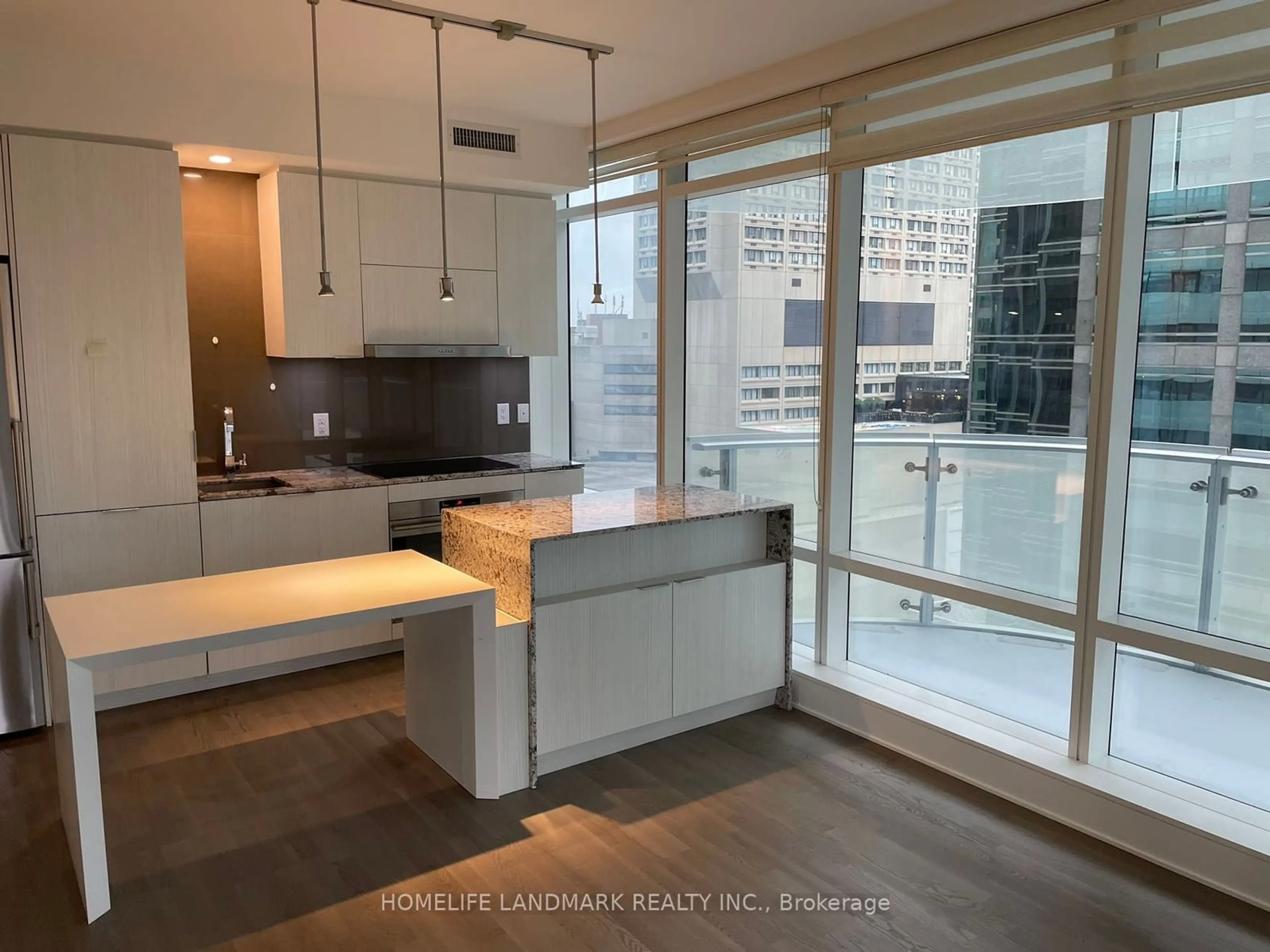 Kitchen with laundary machines for 1 Bloor St #1104, Toronto Ontario M4W 1A9