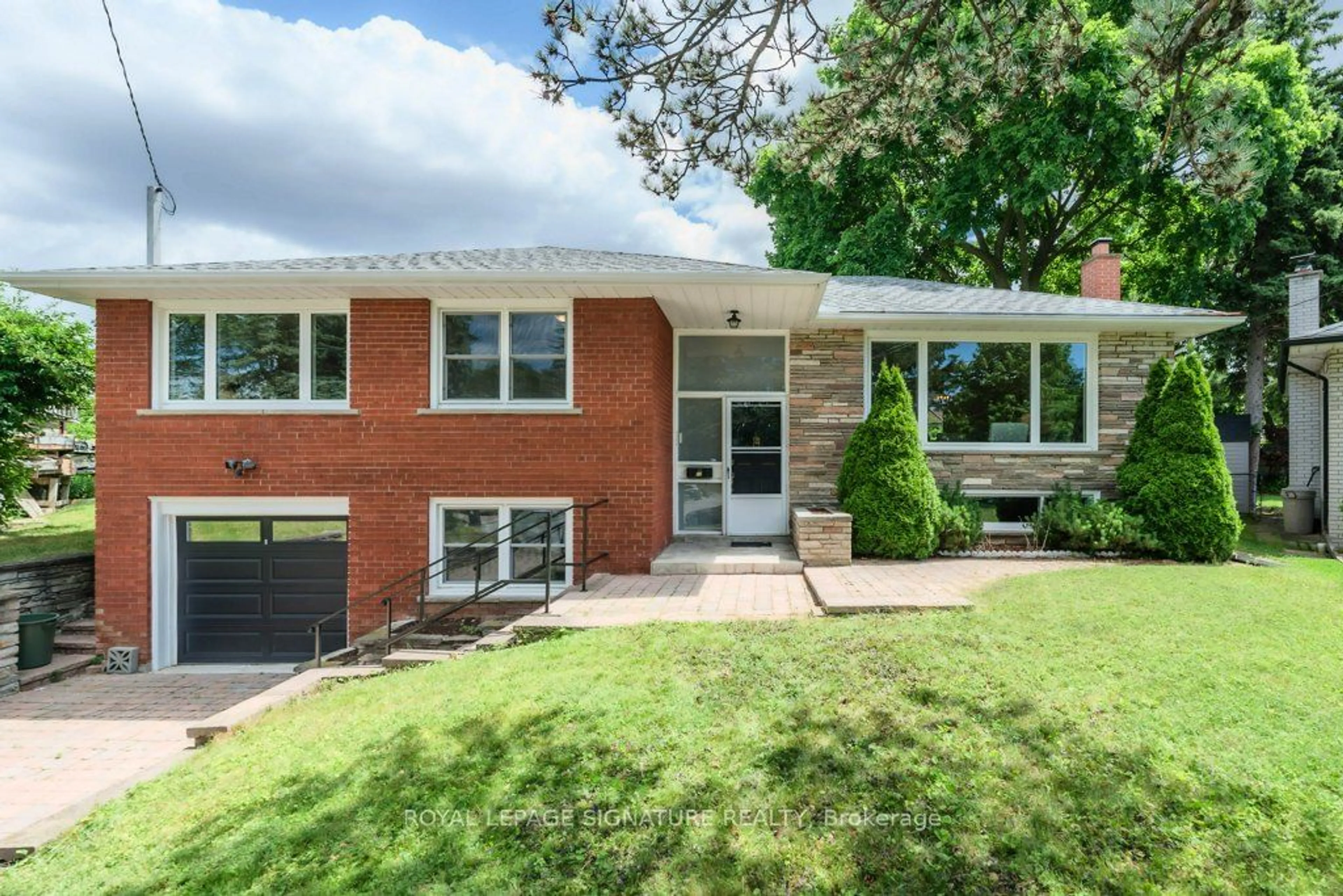 Home with brick exterior material for 12 DONEWEN Crt, Toronto Ontario M4A 1P8
