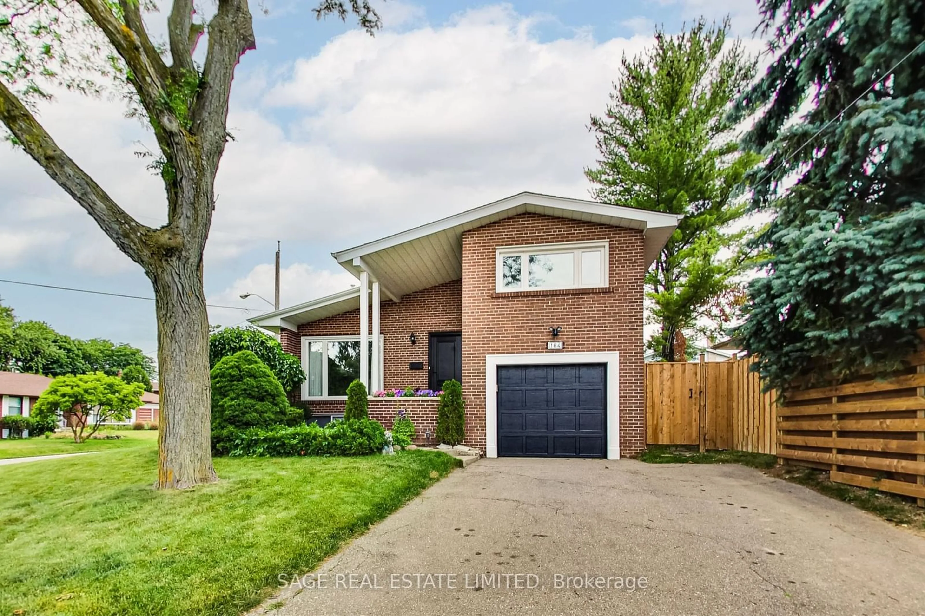 Home with brick exterior material for 164 Sweeney Dr, Toronto Ontario M4A 1V2