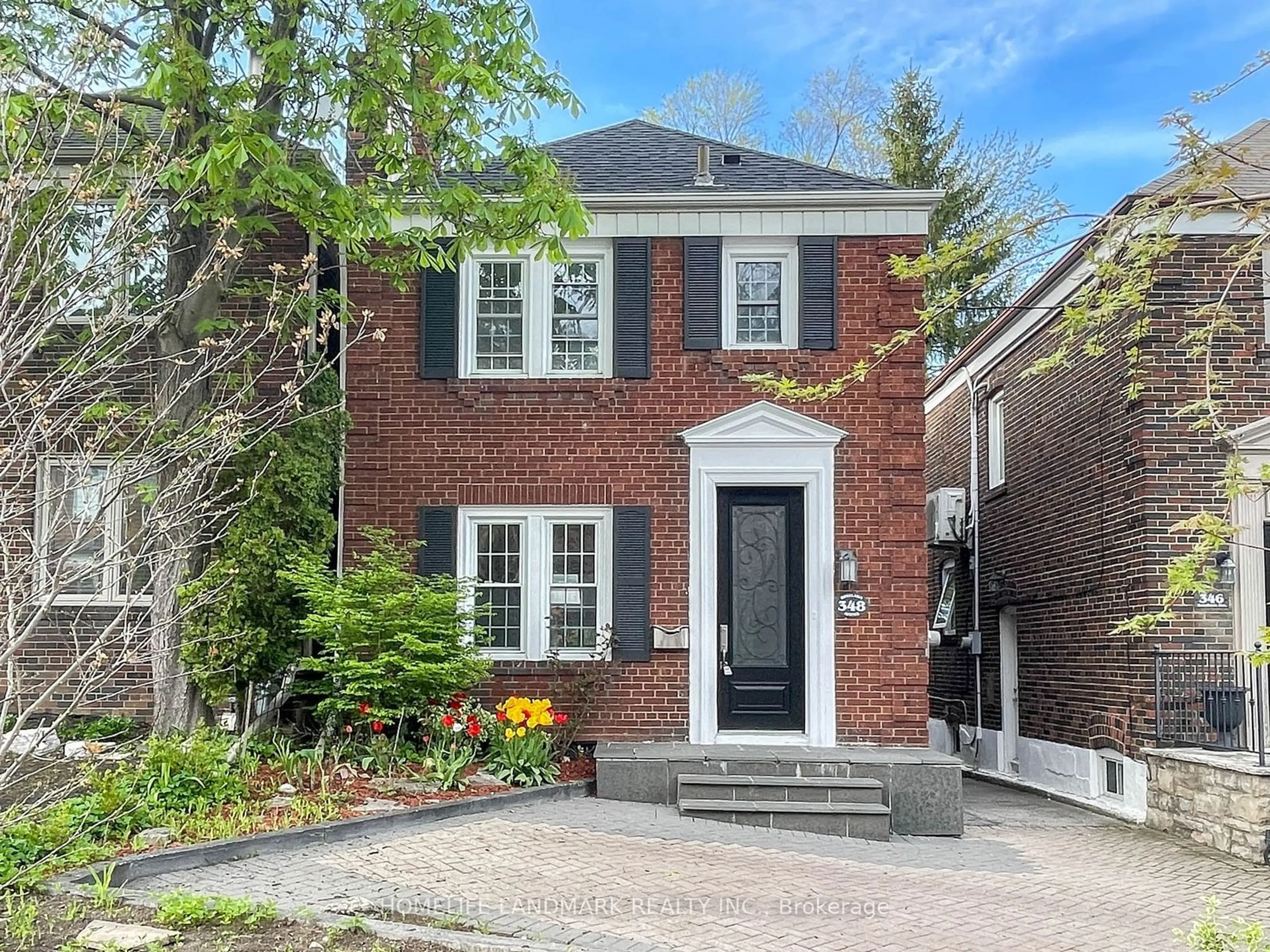 Home with brick exterior material for 348 Roselawn Ave, Toronto Ontario M4R 1G1