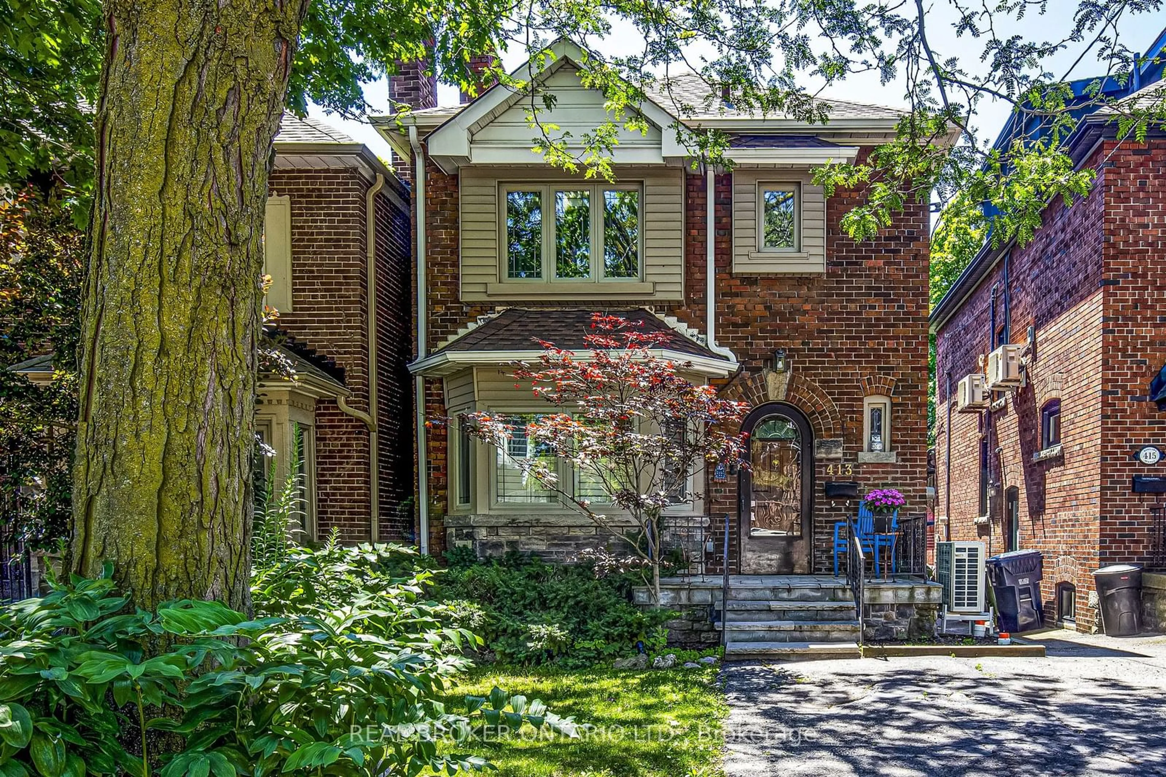 Home with brick exterior material for 413 Roselawn Ave, Toronto Ontario M5N 1J9