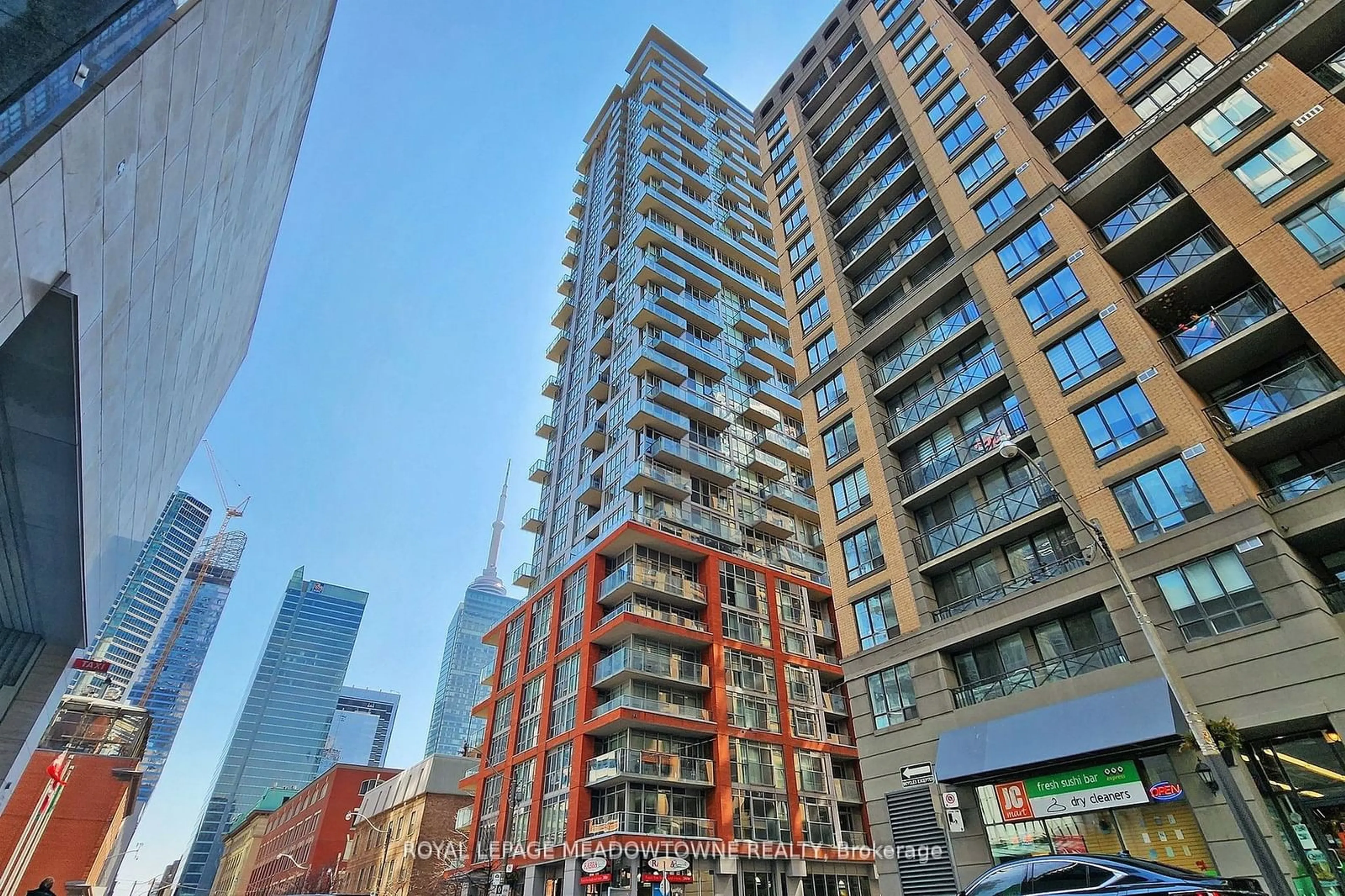 A pic from exterior of the house or condo for 126 Simcoe St #301, Toronto Ontario M5H 4E6