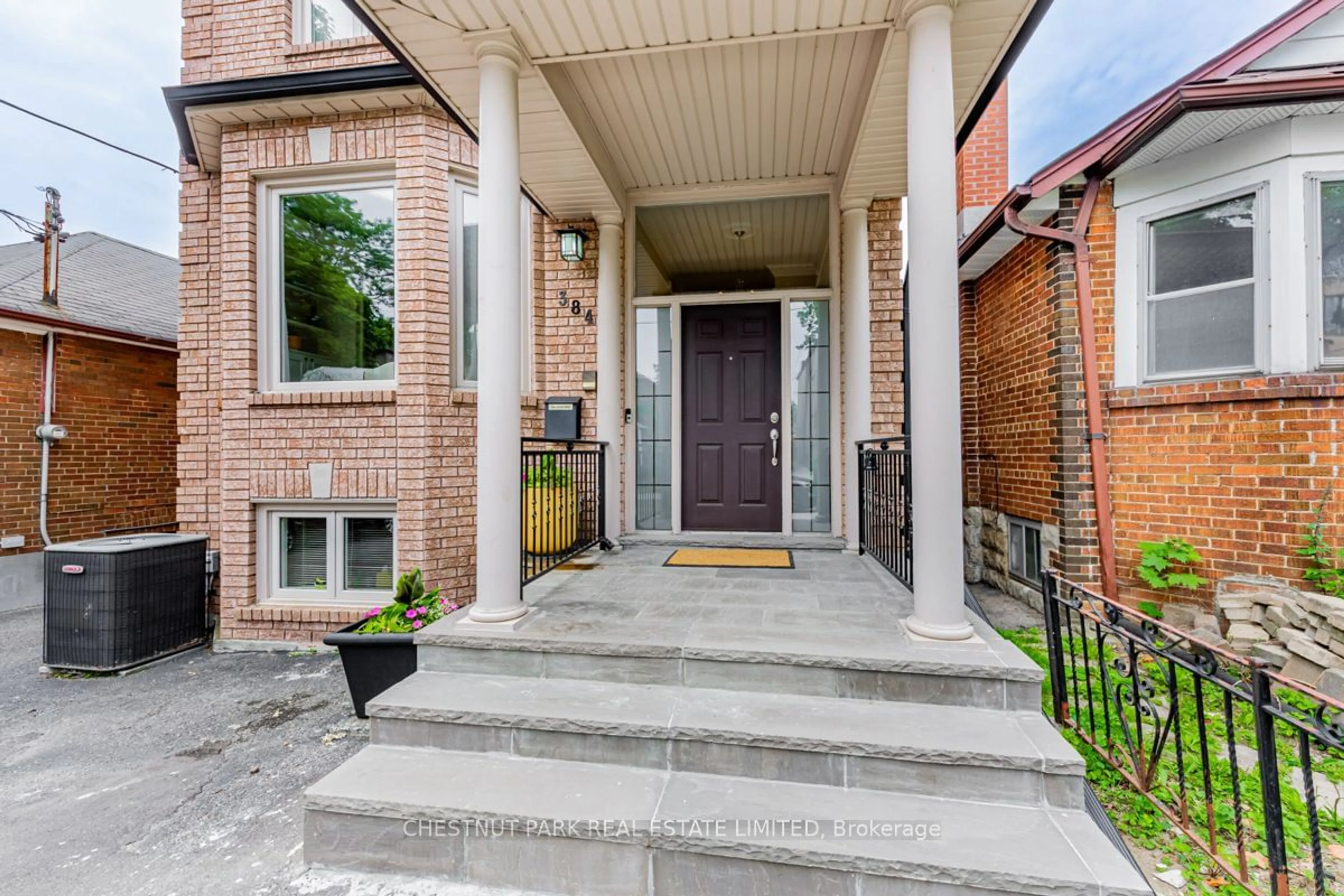 Home with brick exterior material for 384 Winnett Ave, Toronto Ontario M6C 3M1