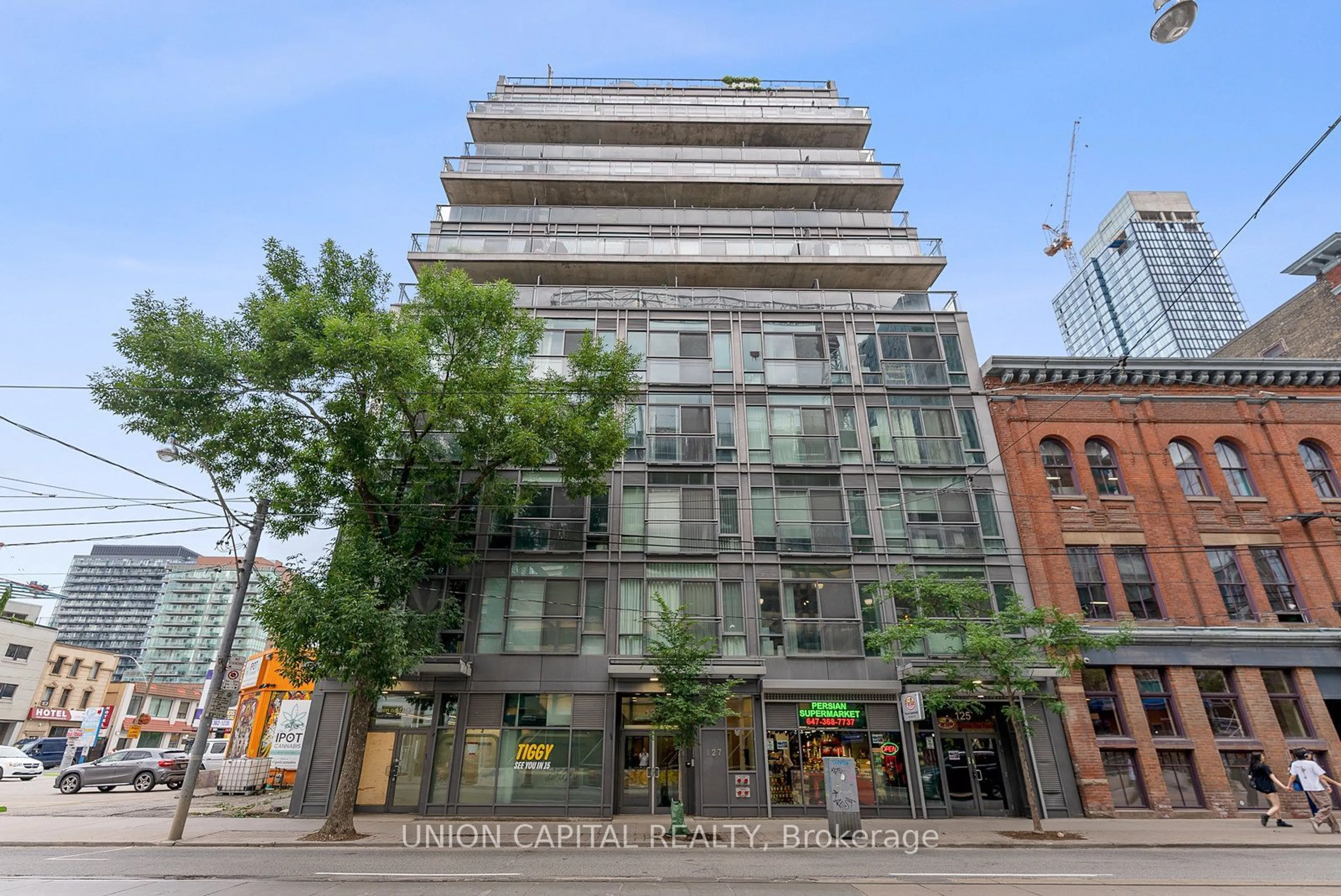 A pic from exterior of the house or condo for 127 Queen St #203, Toronto Ontario M5C 1S3
