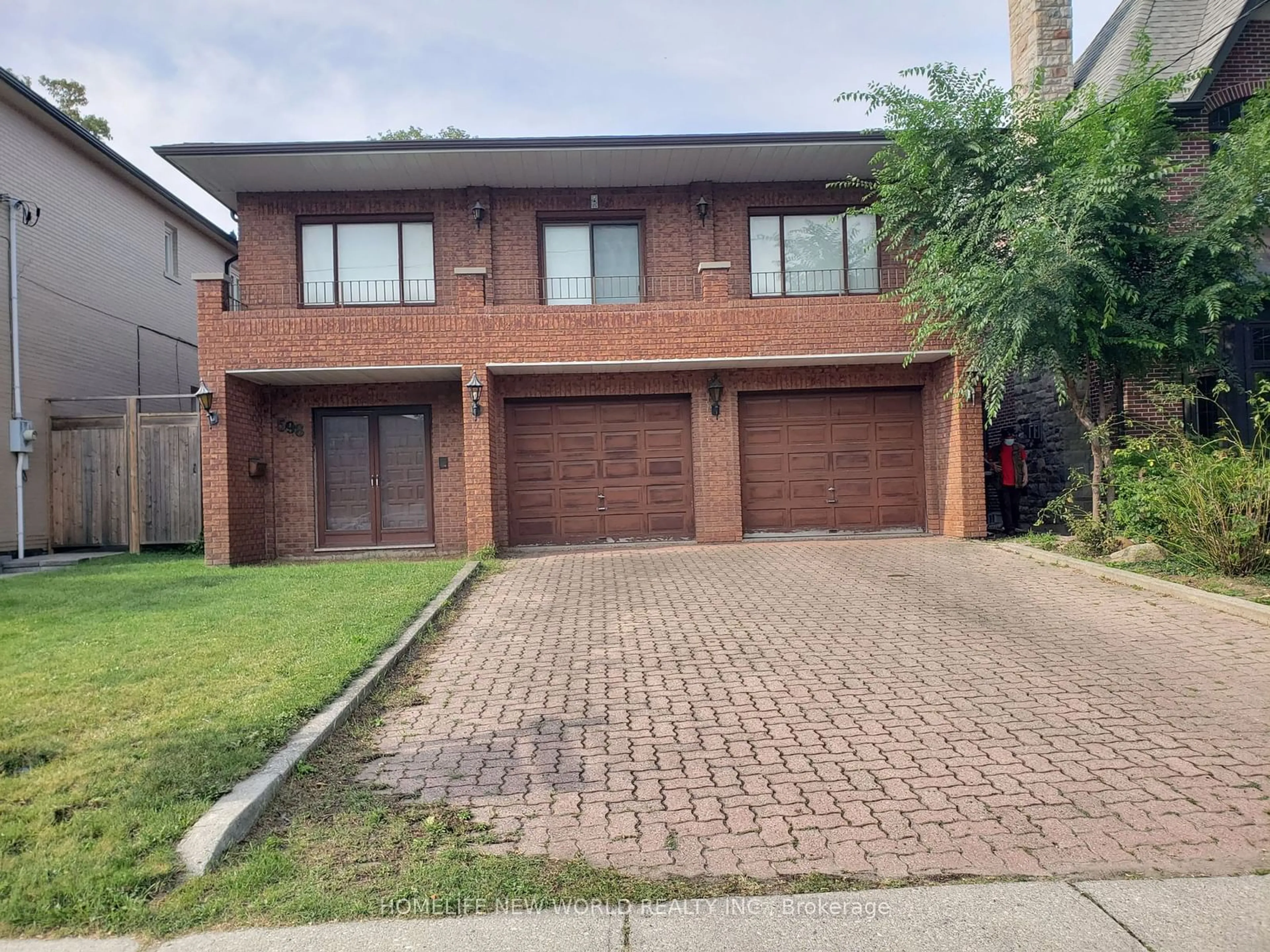 Home with brick exterior material for 598 Glengrove Ave, Toronto Ontario M6B 2H8