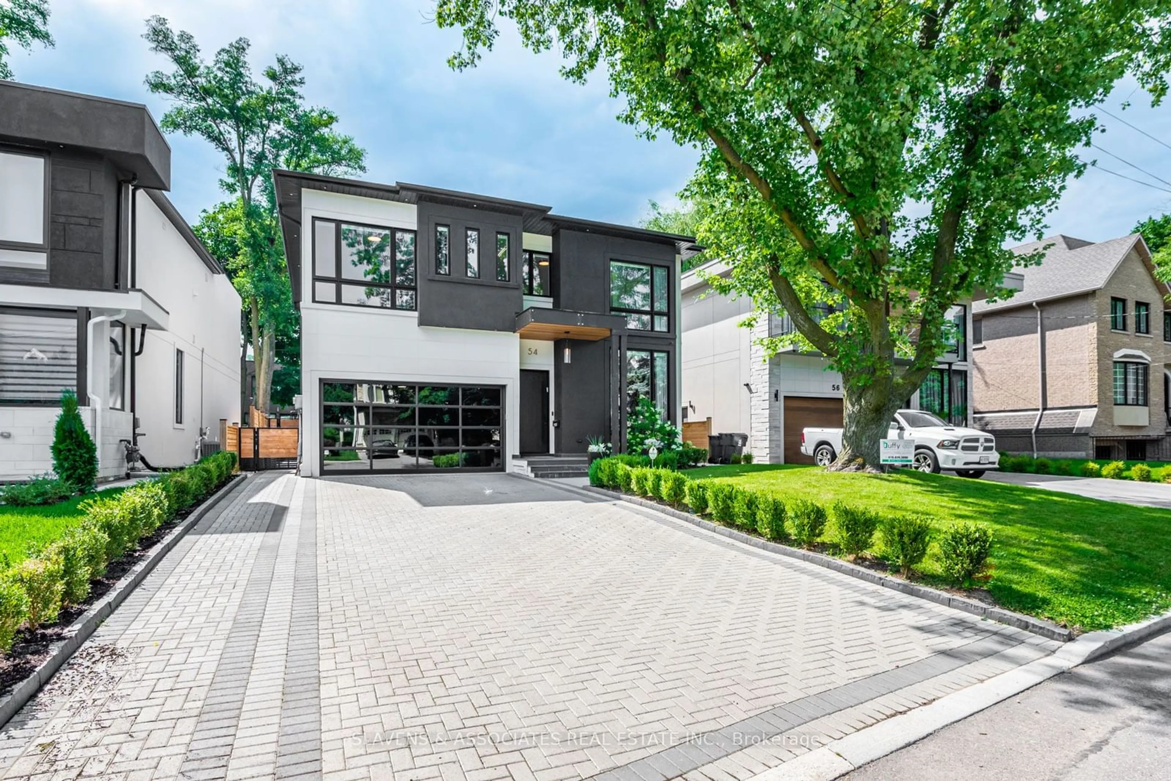 Home with brick exterior material for 54 Corwin Cres, Toronto Ontario M3H 2A1