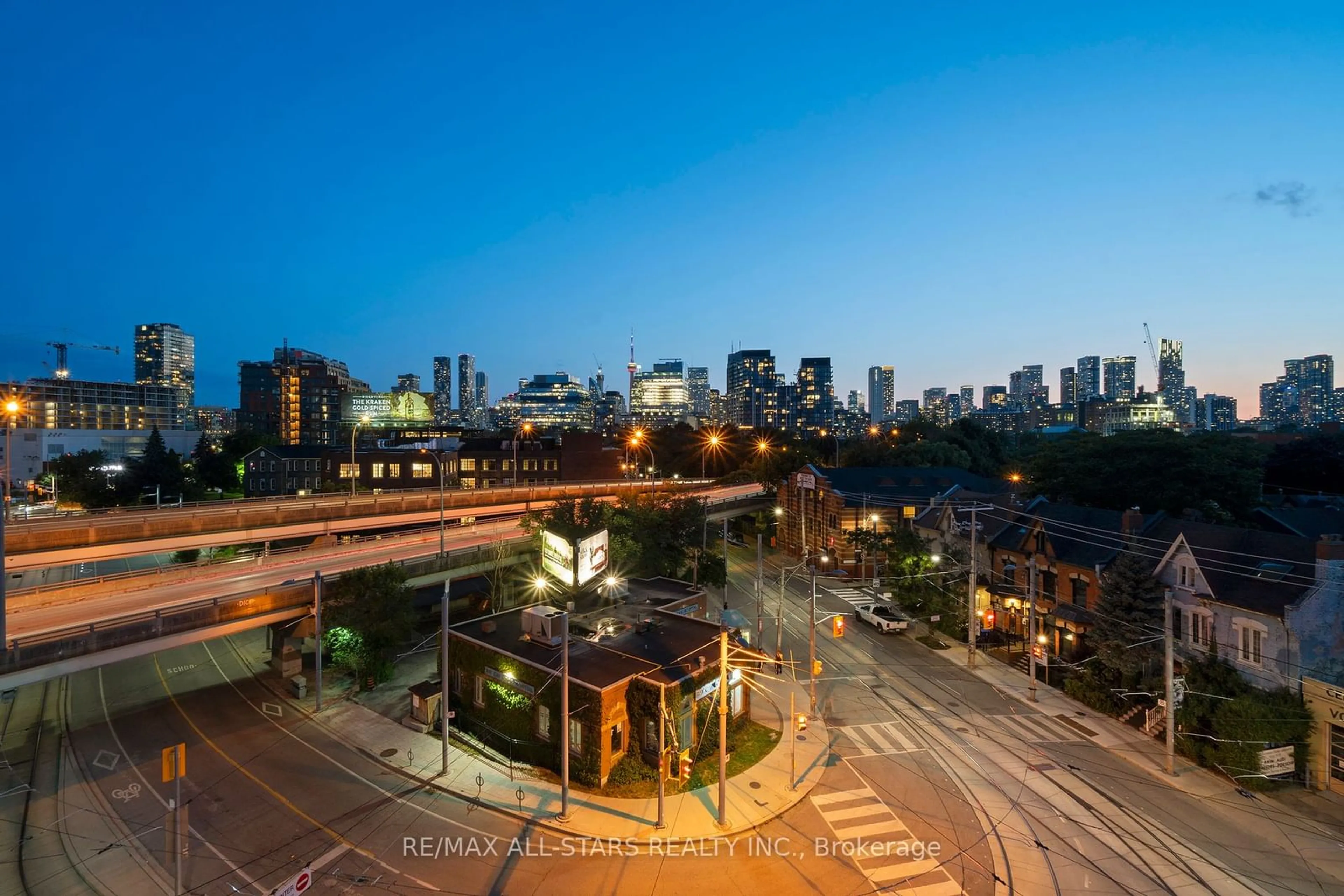 A view of a street for 549 King St #506, Toronto Ontario M5A 1M4