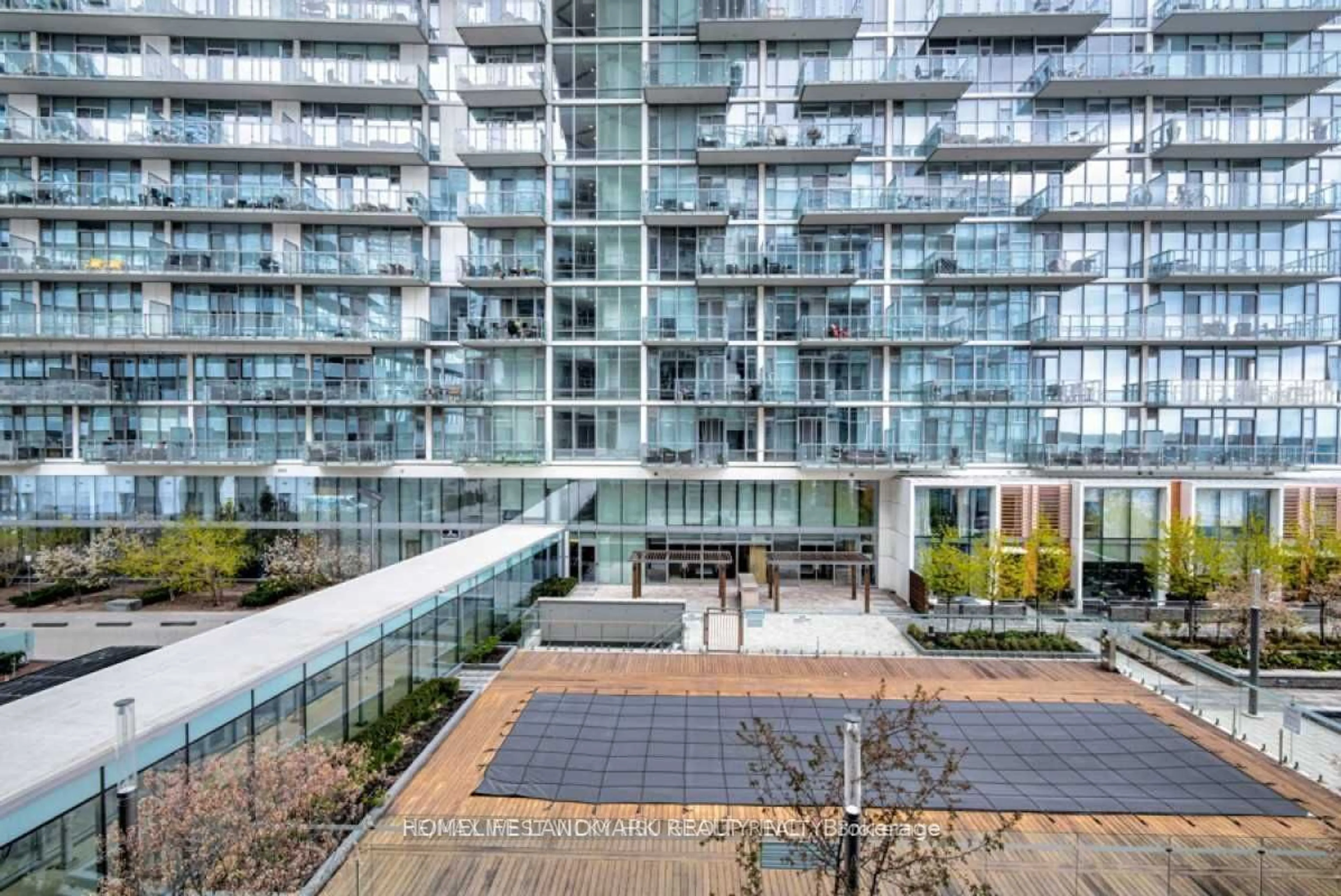 A pic from exterior of the house or condo for 29 Queens Quay #Th102, Toronto Ontario M5E 0A4