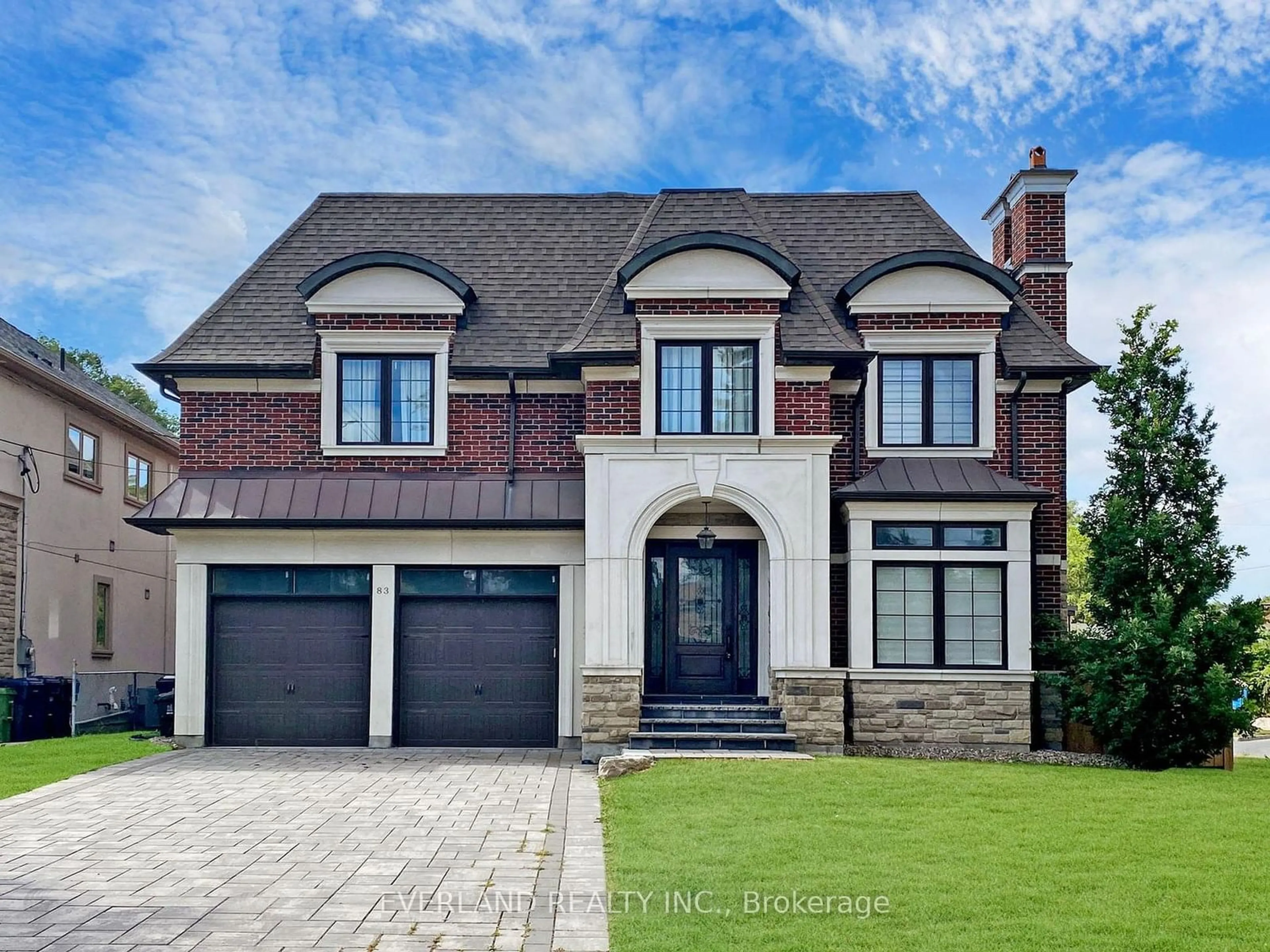 Home with brick exterior material for 83 Ridgevale Dr, Toronto Ontario M6A 2L1