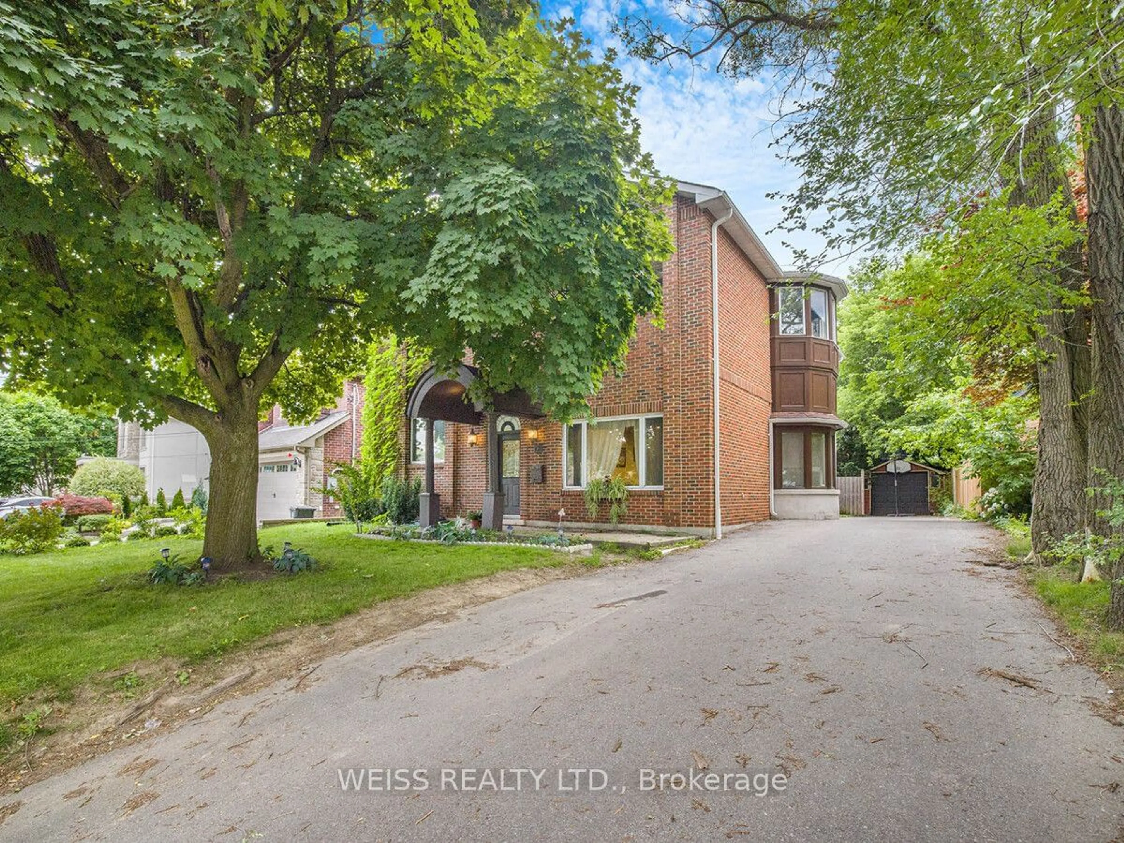 Frontside or backside of a home, the street view for 81 Brucewood Cres, Toronto Ontario M6A 2G9