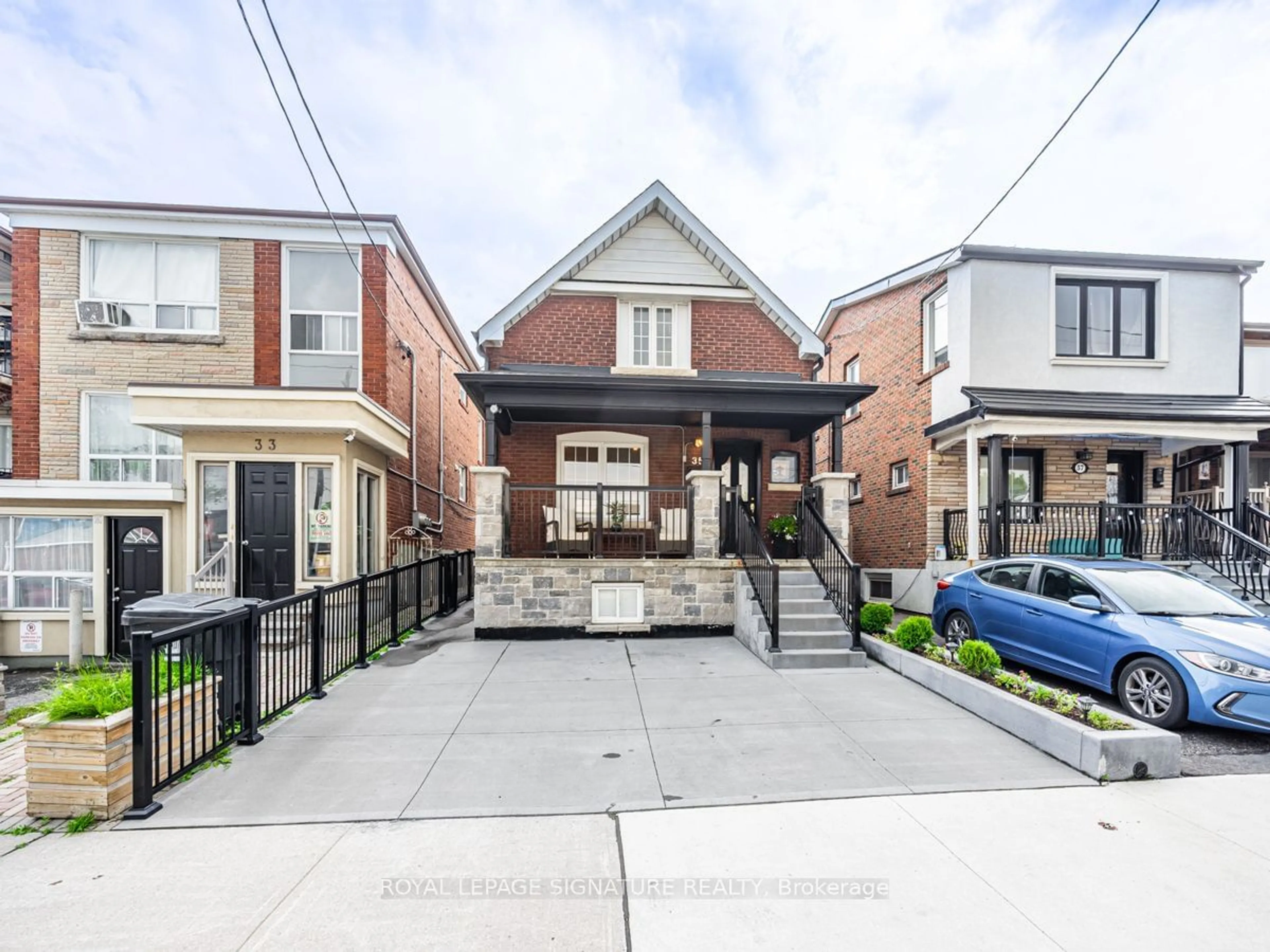 Frontside or backside of a home for 35 Rogers Rd, Toronto Ontario M6E 1N5