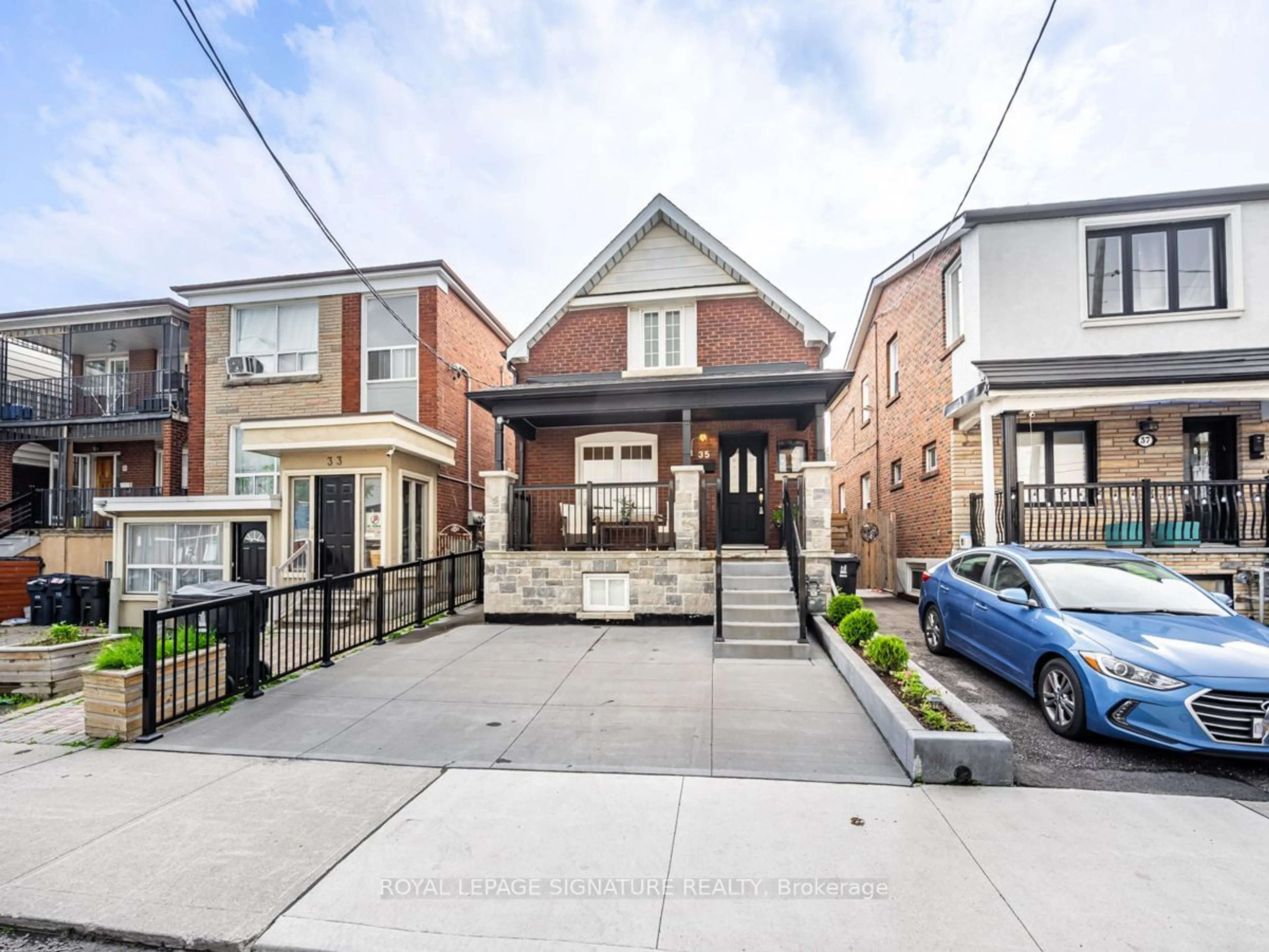 Frontside or backside of a home for 35 Rogers Rd, Toronto Ontario M6E 1N5