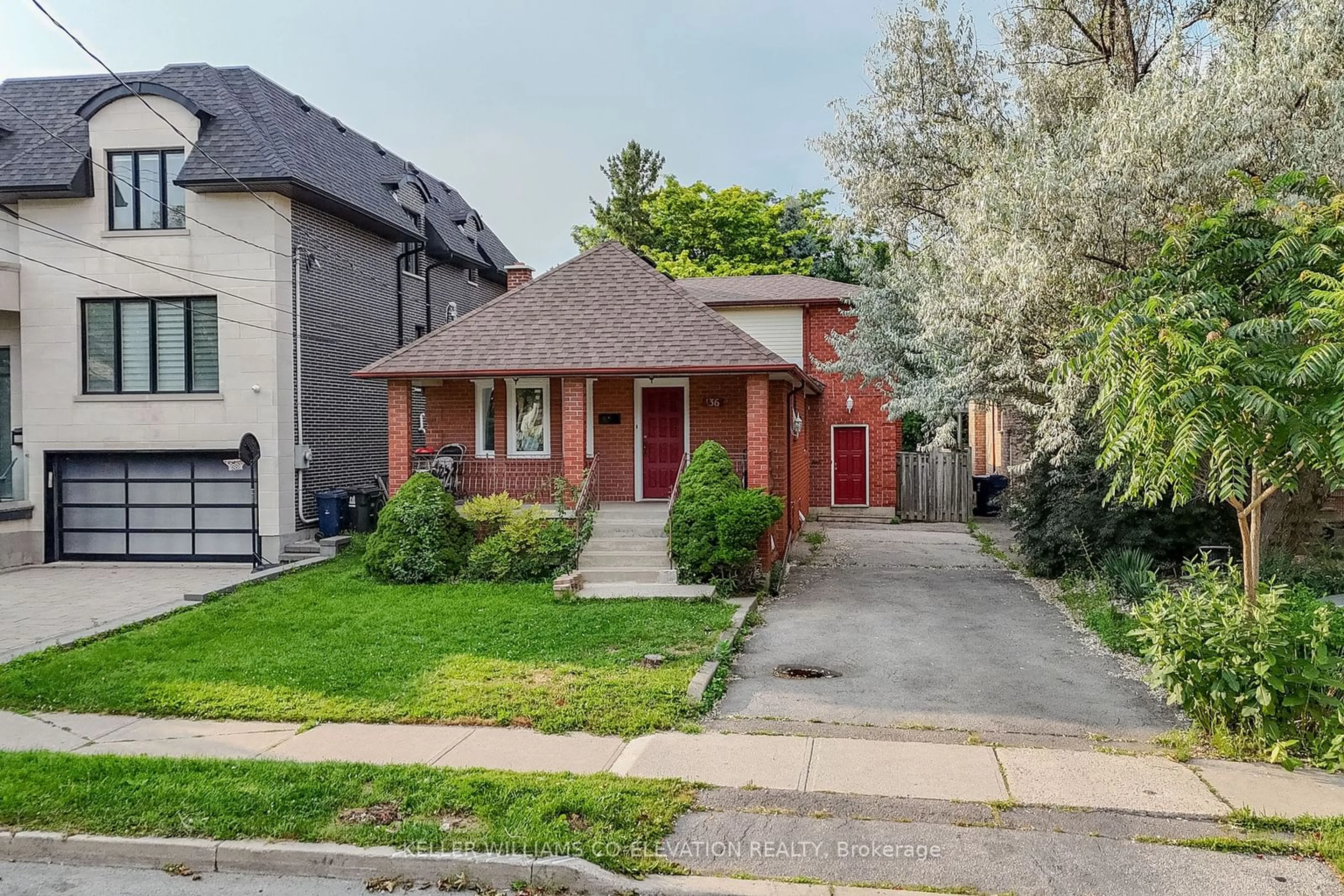 Frontside or backside of a home for 136 Glen Park Ave, Toronto Ontario M6B 2C5