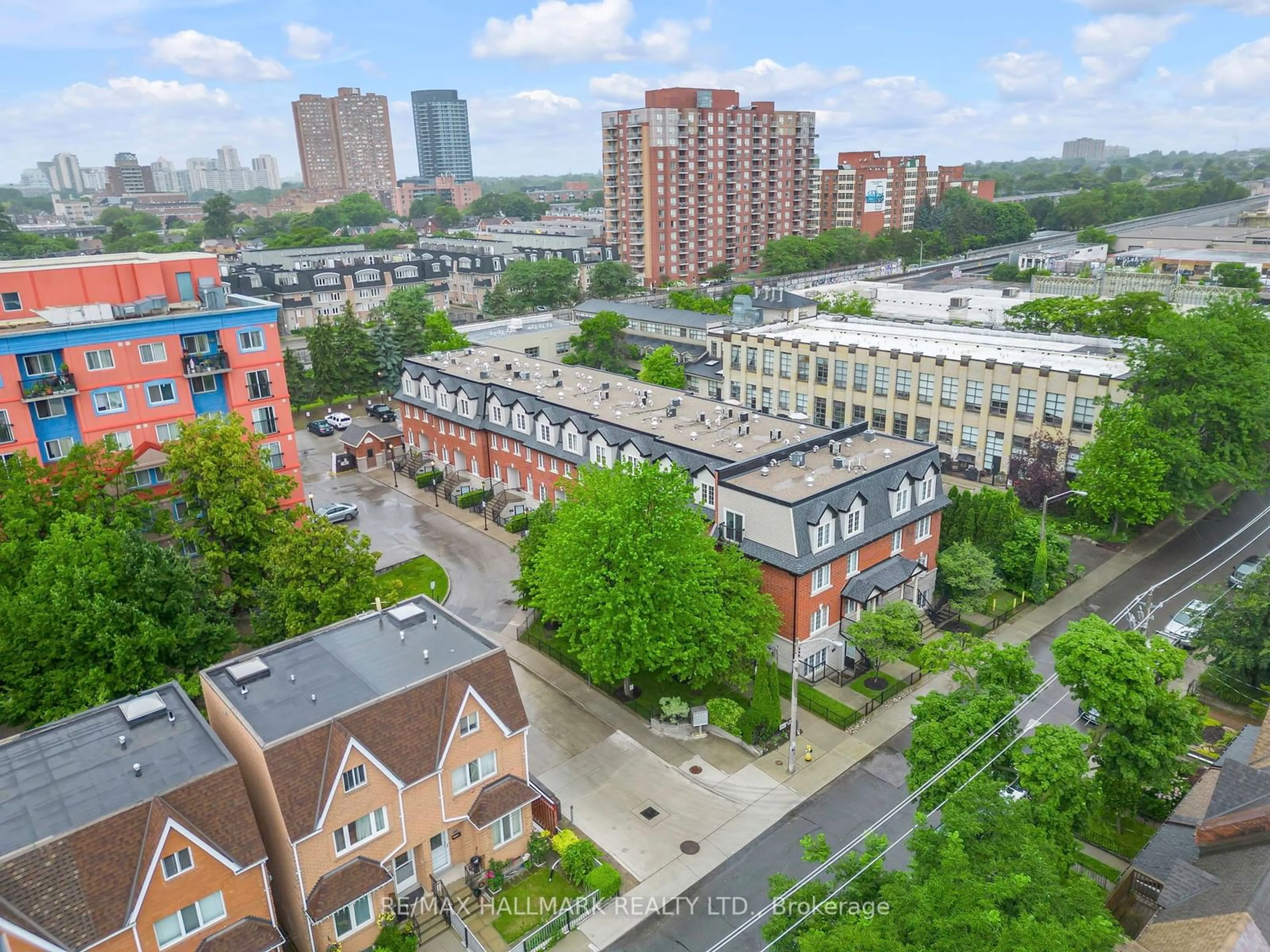 A view of a street for 262 St Helens Ave #105, Toronto Ontario M6H 4A4