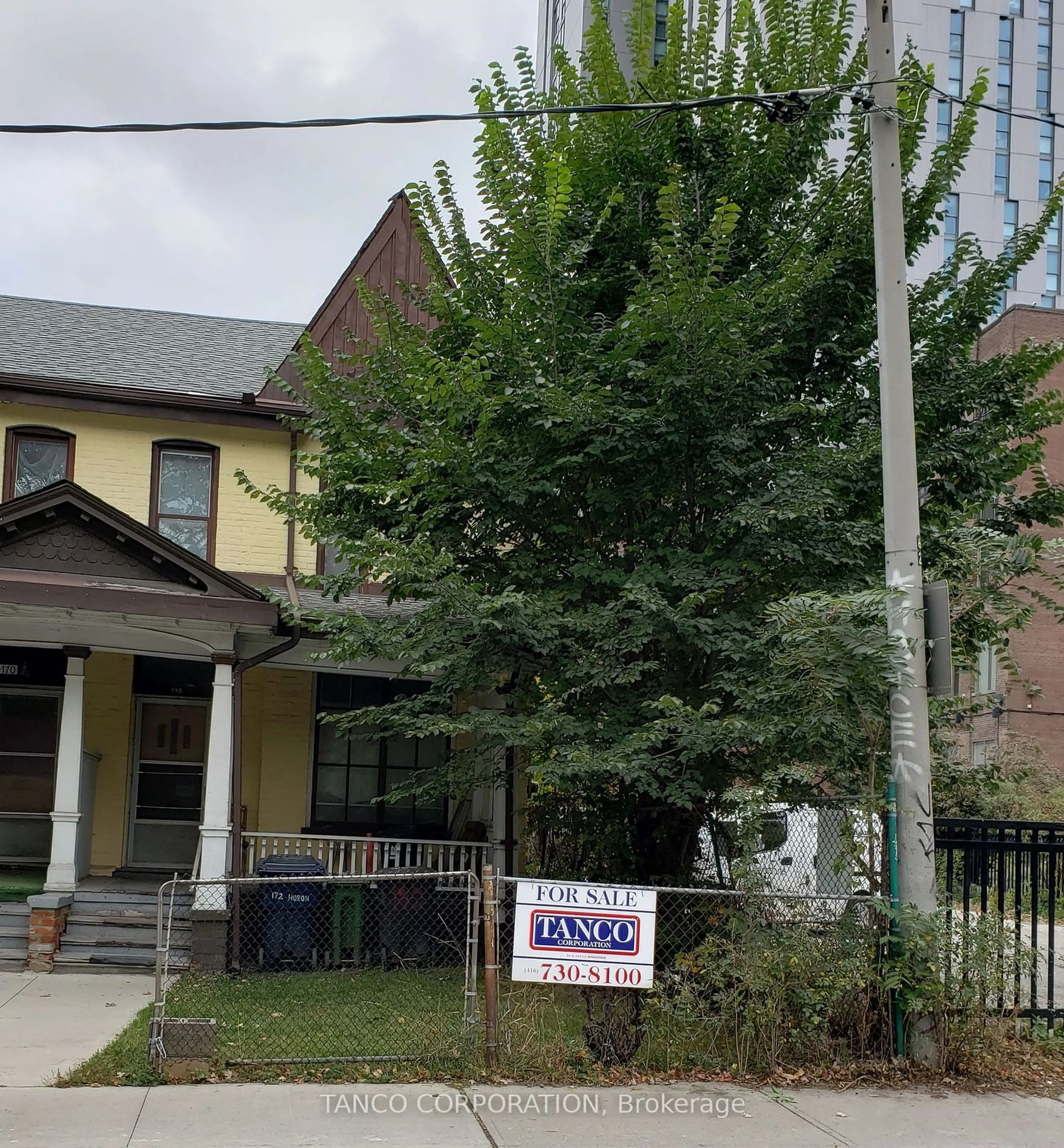 Frontside or backside of a home, the front or back of building for 172 Huron St, Toronto Ontario M5T 2B4