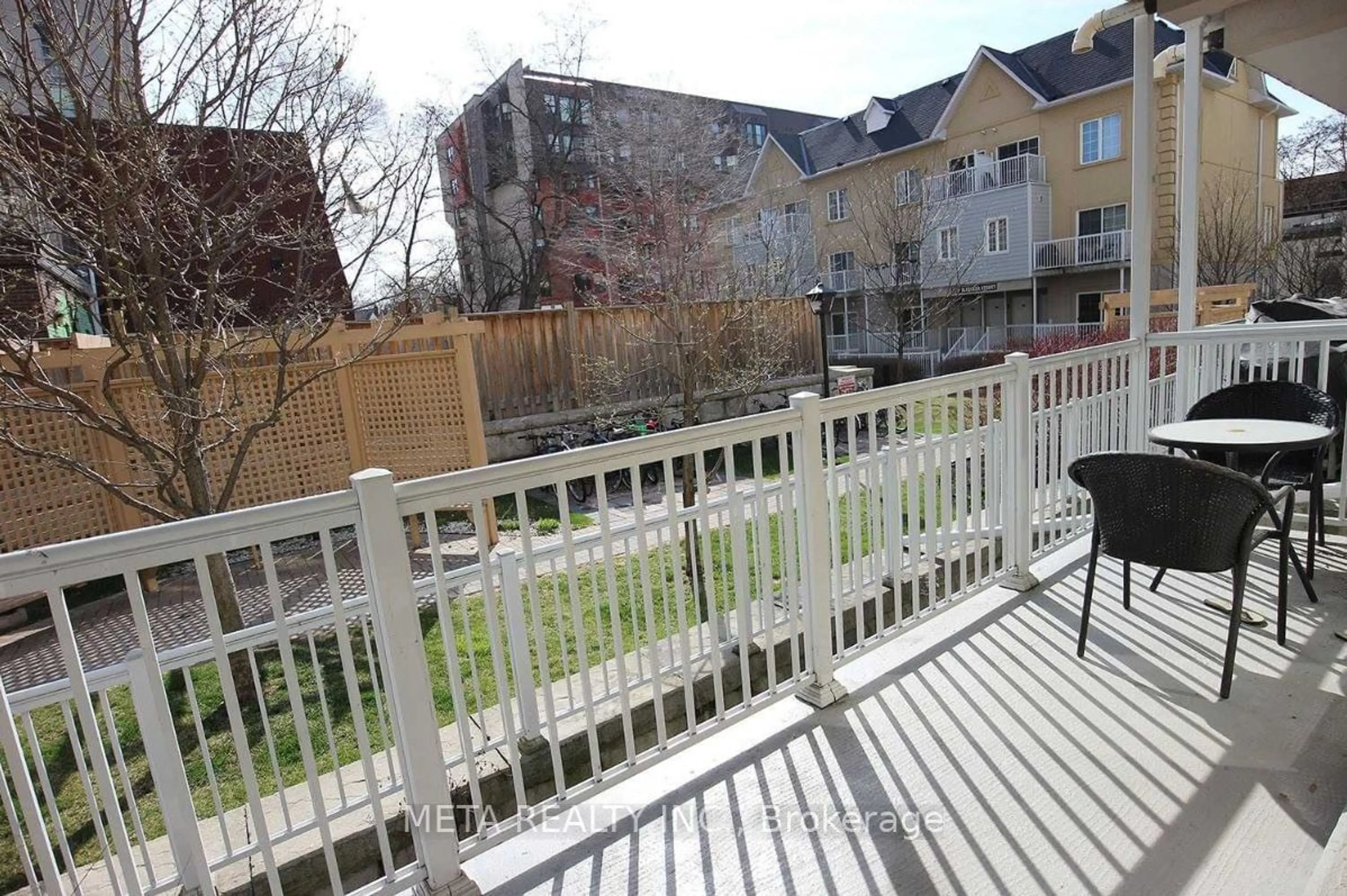 Patio, the fenced backyard for 175 Bleecker St #213, Toronto Ontario M4X 1L9