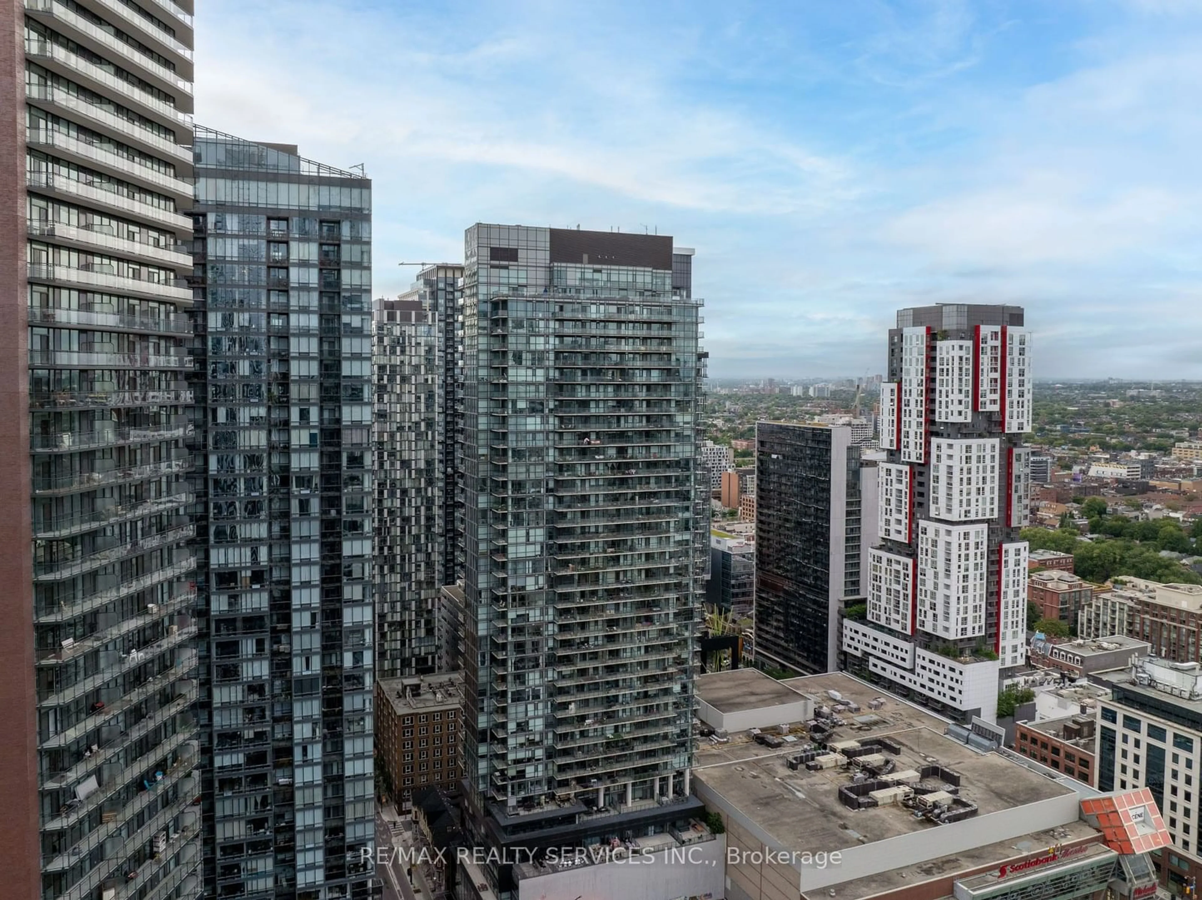 A pic from exterior of the house or condo, the view of city buildings for 290 Adelaide St #1901, Toronto Ontario M5V 0P3