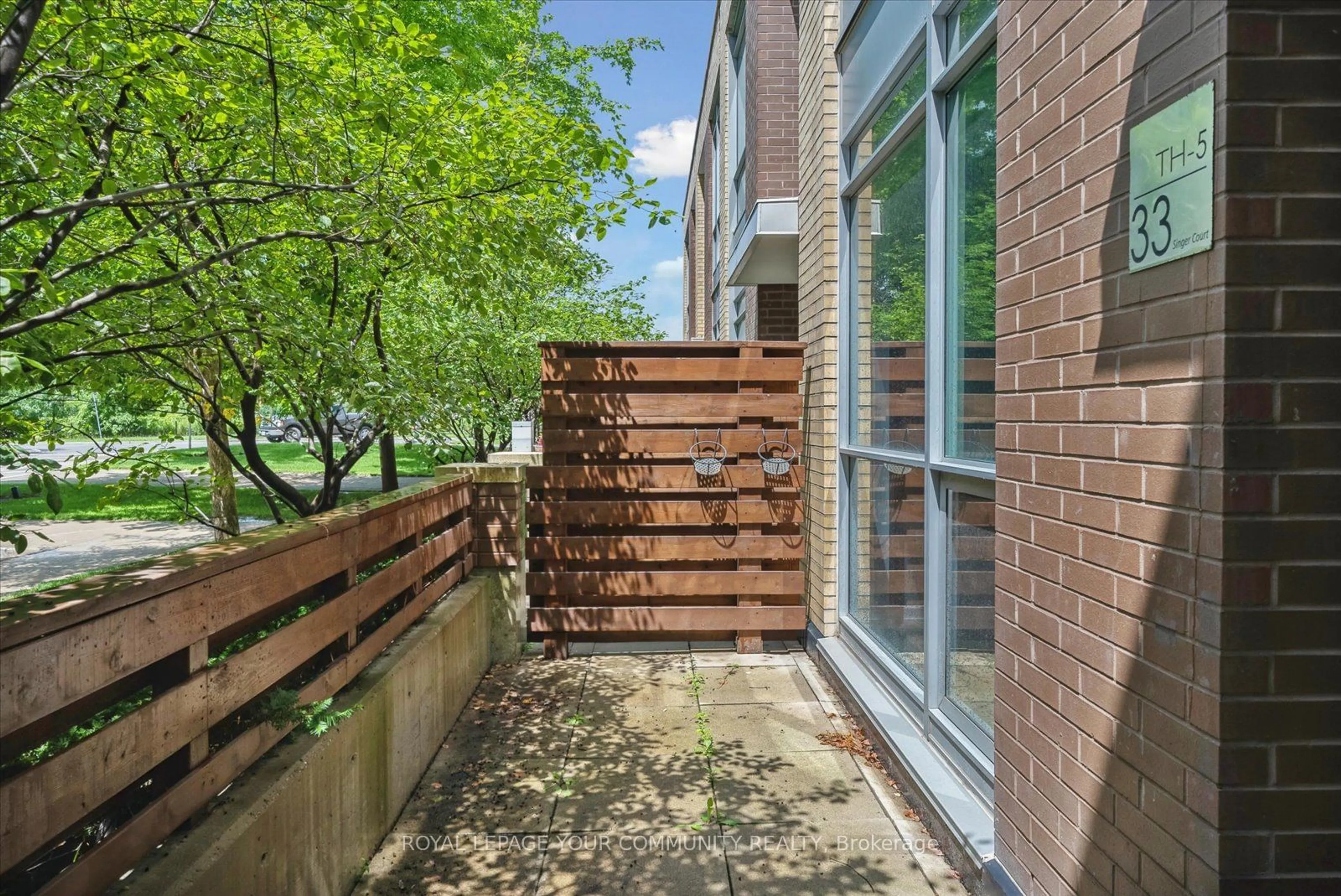 Patio, the fenced backyard for 33 Singer Crt #TH5, Toronto Ontario M2K 0B4