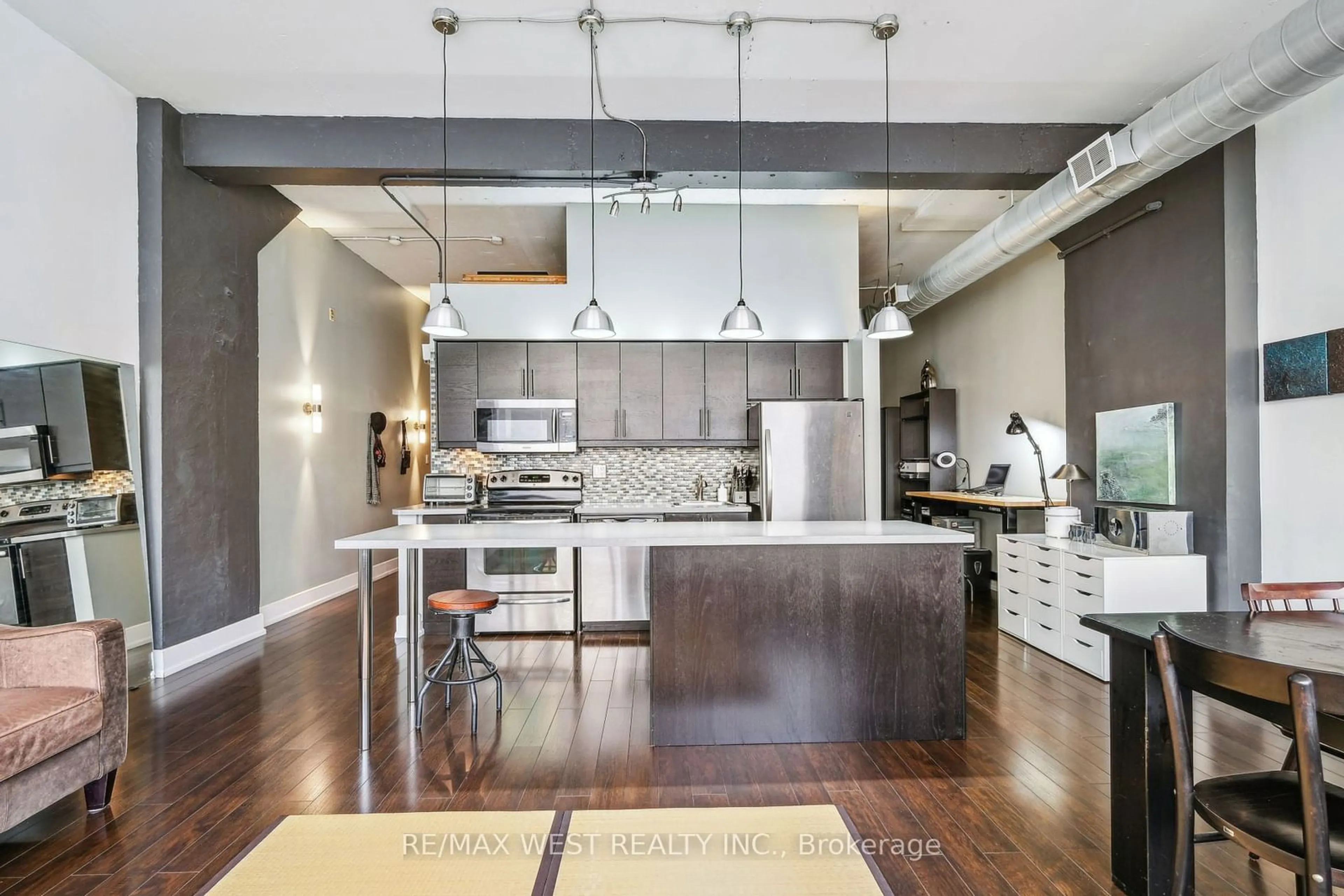 Open concept kitchen for 365 Dundas St #111, Toronto Ontario M5A 4R9