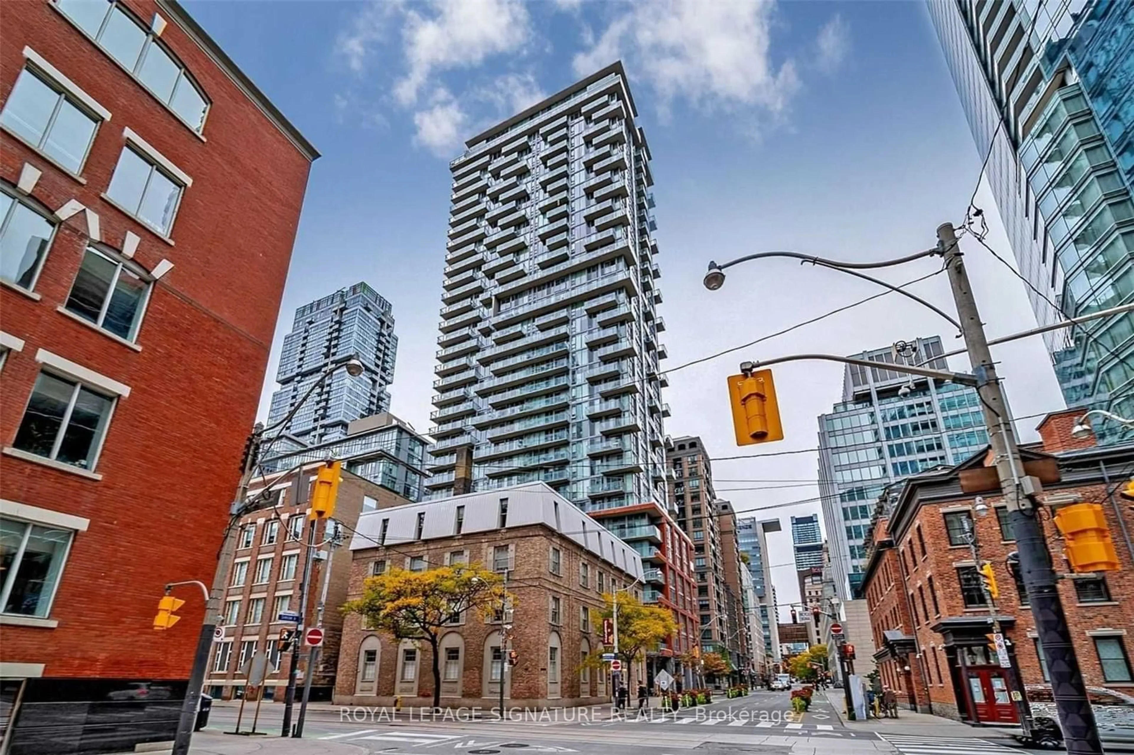 A pic from exterior of the house or condo for 126 Simcoe St #402, Toronto Ontario M5H 4E6