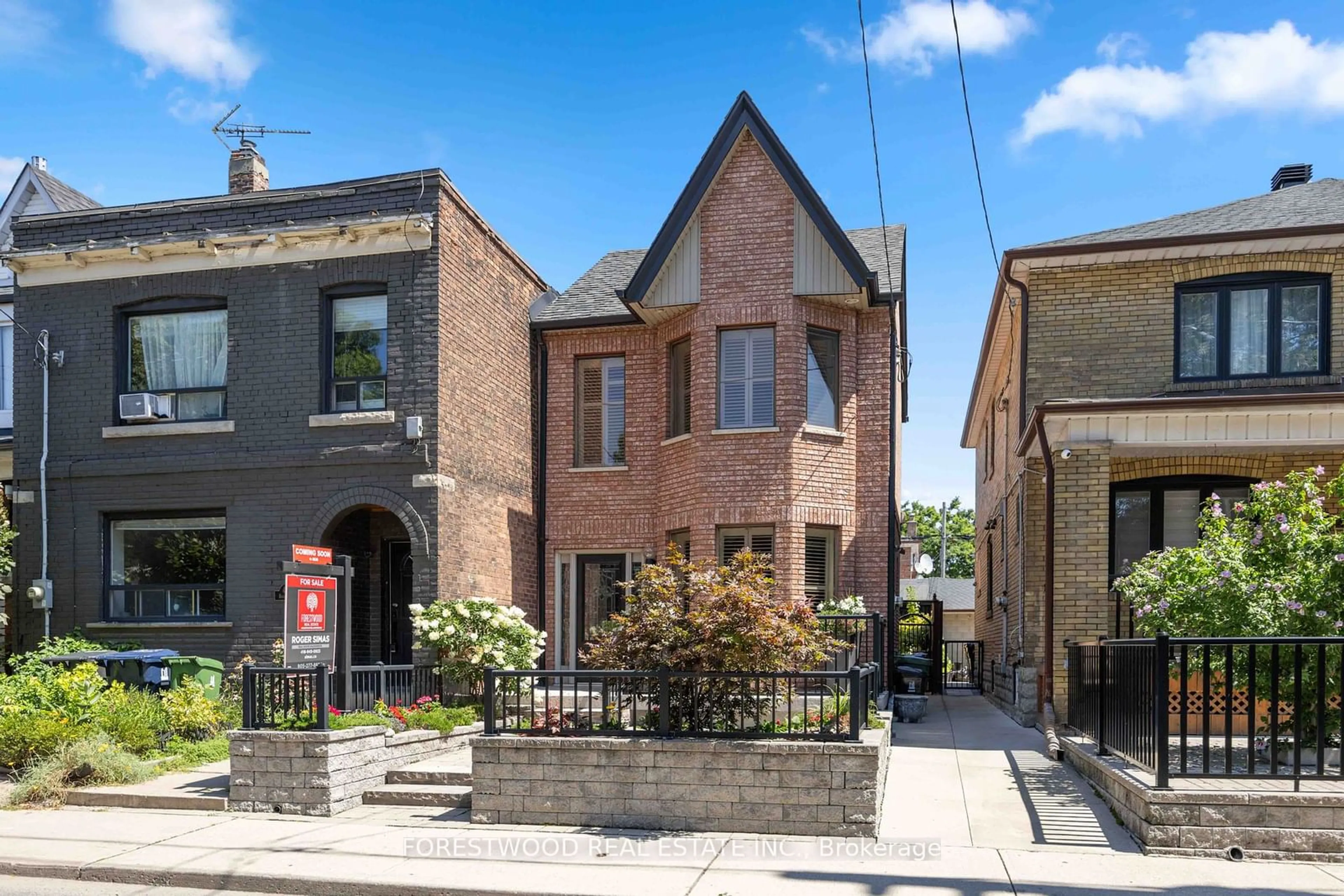 Home with brick exterior material for 449 Brock Ave, Toronto Ontario M6H 3N7