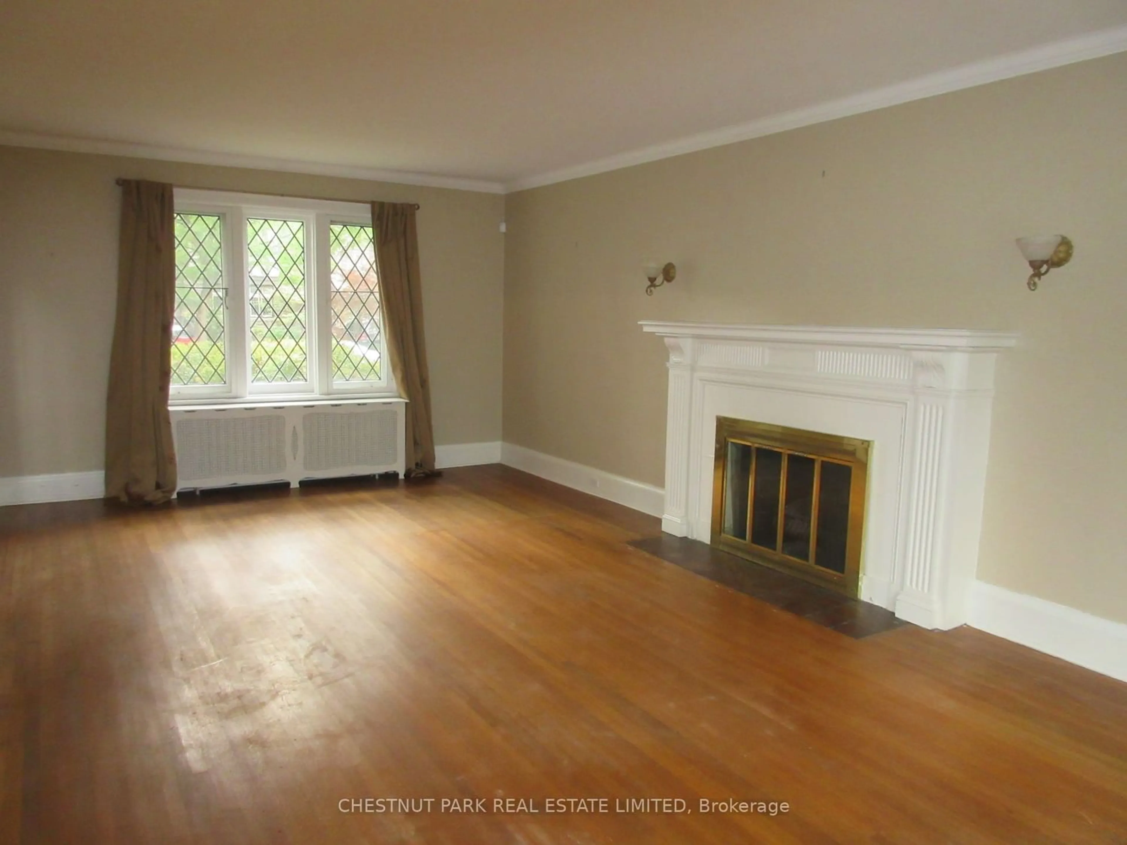 A pic of a room, wood floors for 46 Elderwood Dr, Toronto Ontario M5P 1X1