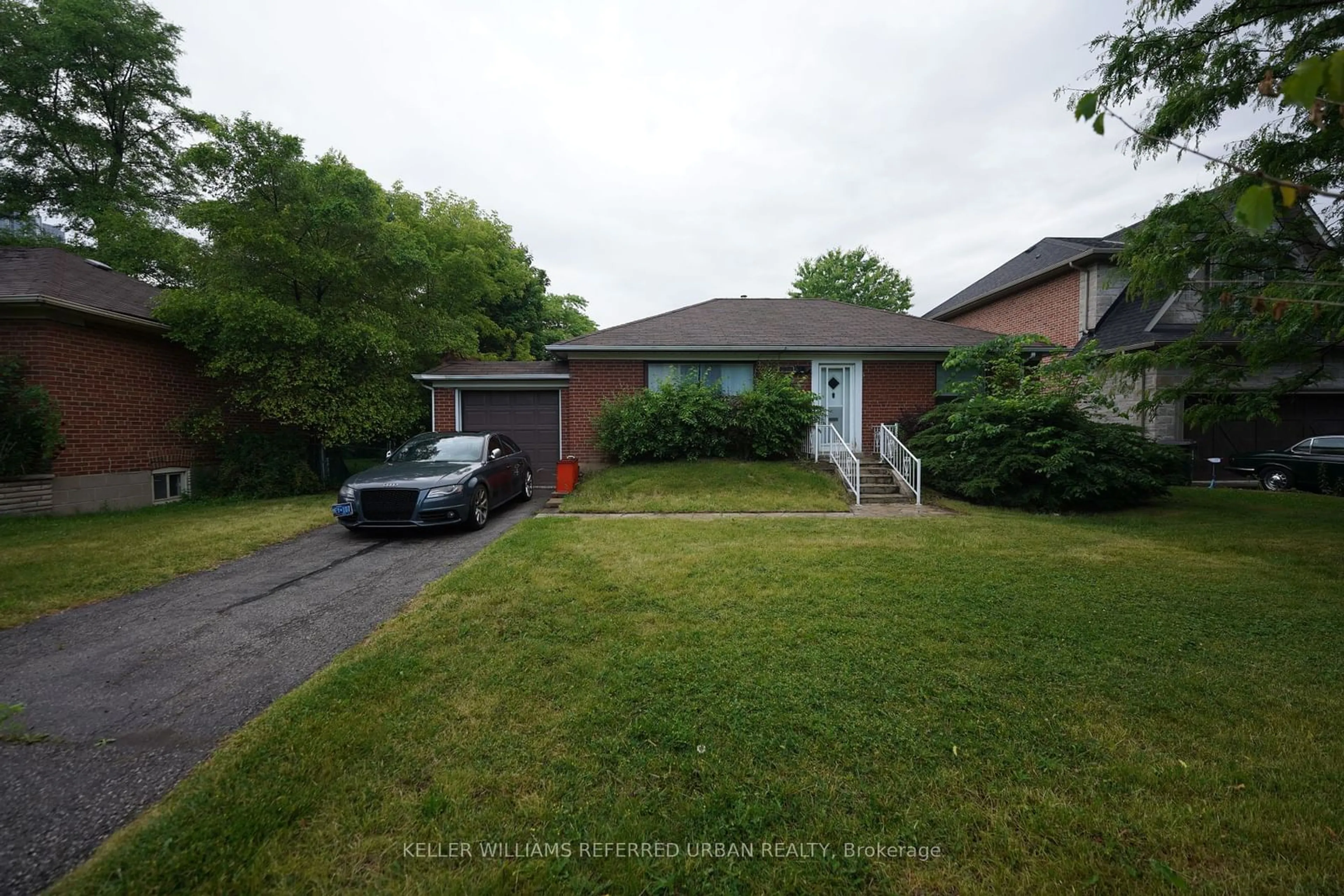 Frontside or backside of a home, the street view for 134 Upper Canada Dr, Toronto Ontario M2P 1S4