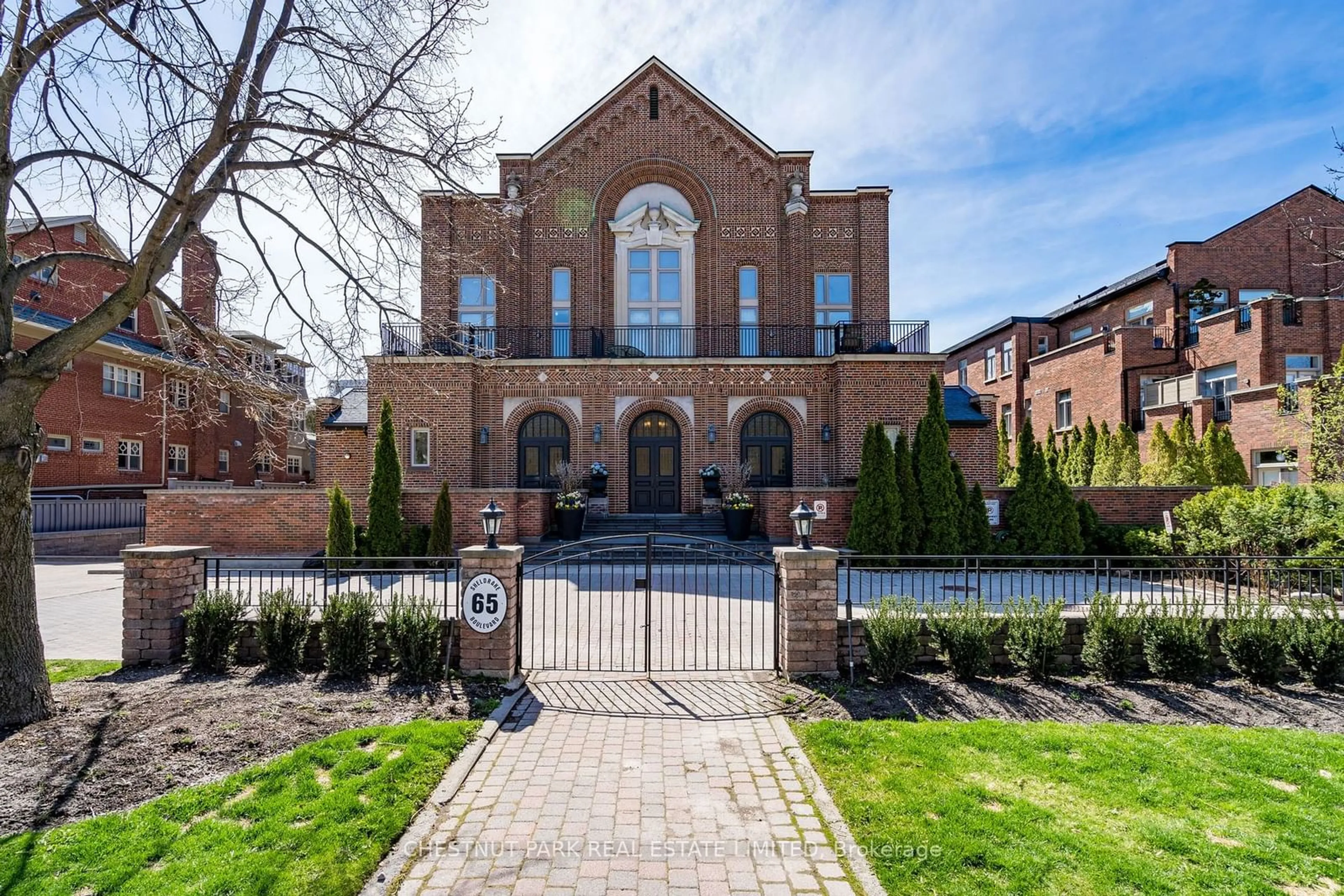 Home with brick exterior material for 65 Sheldrake Blvd #103, Toronto Ontario M4P 2B1