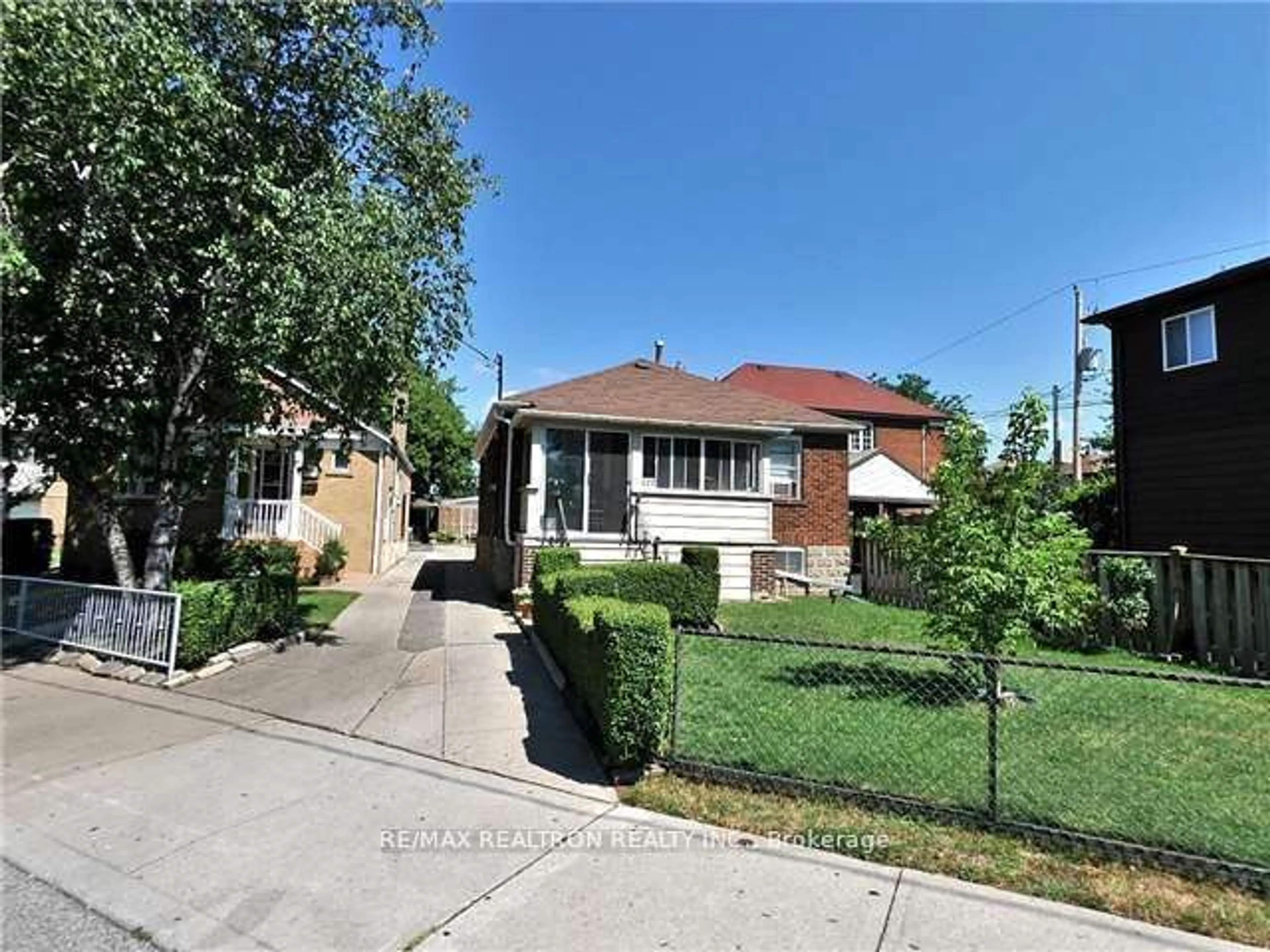 Frontside or backside of a home, the street view for 471 Vaughan Rd, Toronto Ontario M6C 2P5