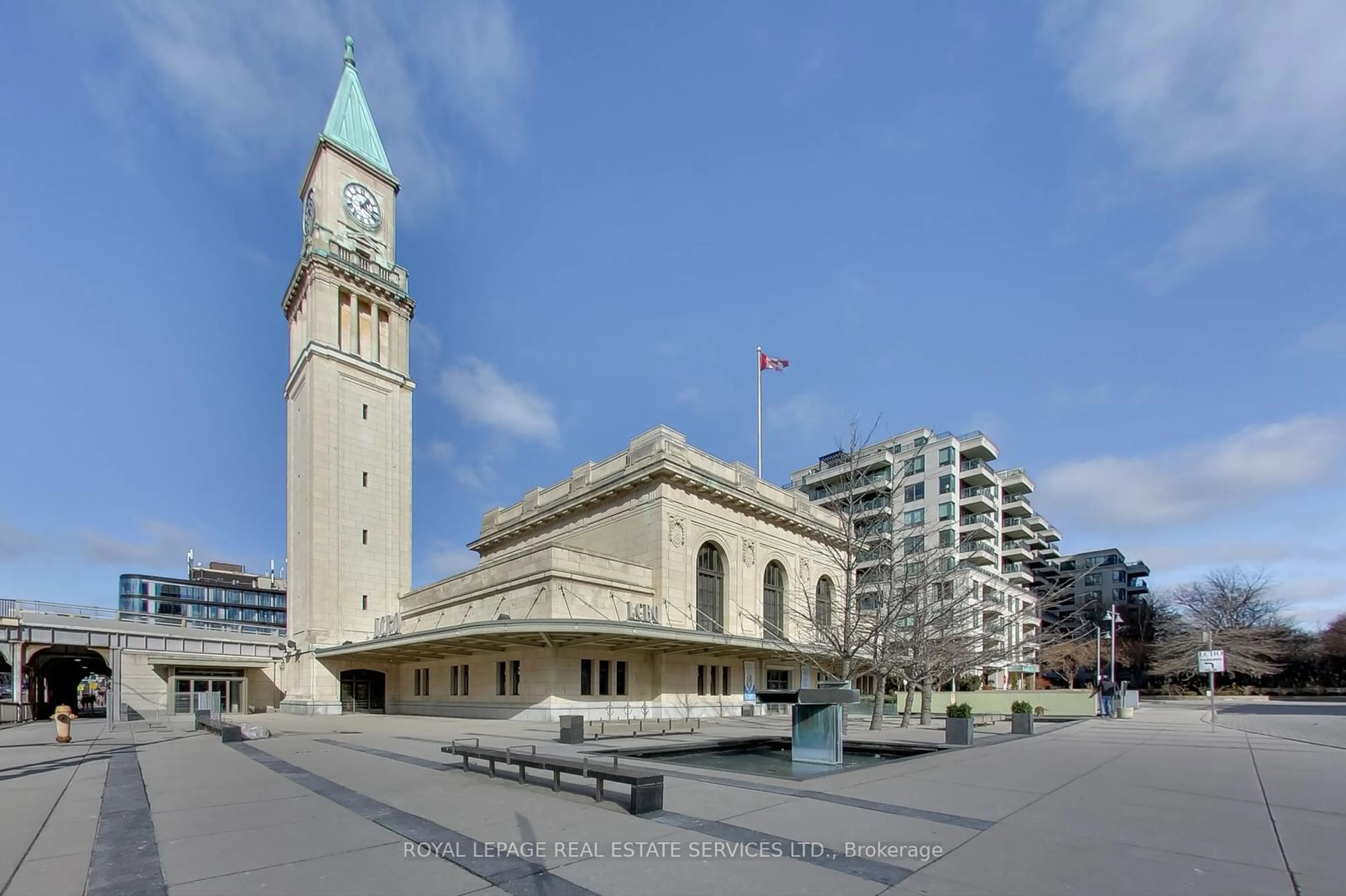 A pic from exterior of the house or condo, the street view for 20 Scrivener Sq #313, Toronto Ontario M4W 3X9