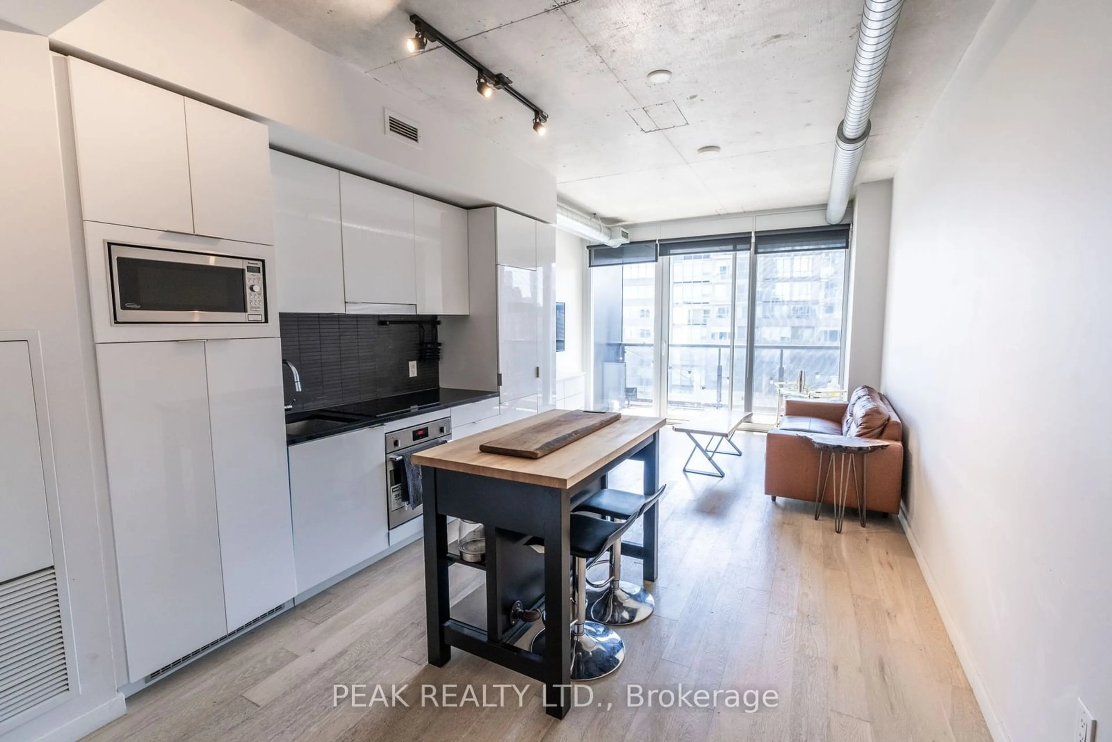 Kitchen with laundary machines for 170 Bayview Ave #803, Toronto Ontario M5A 0M4