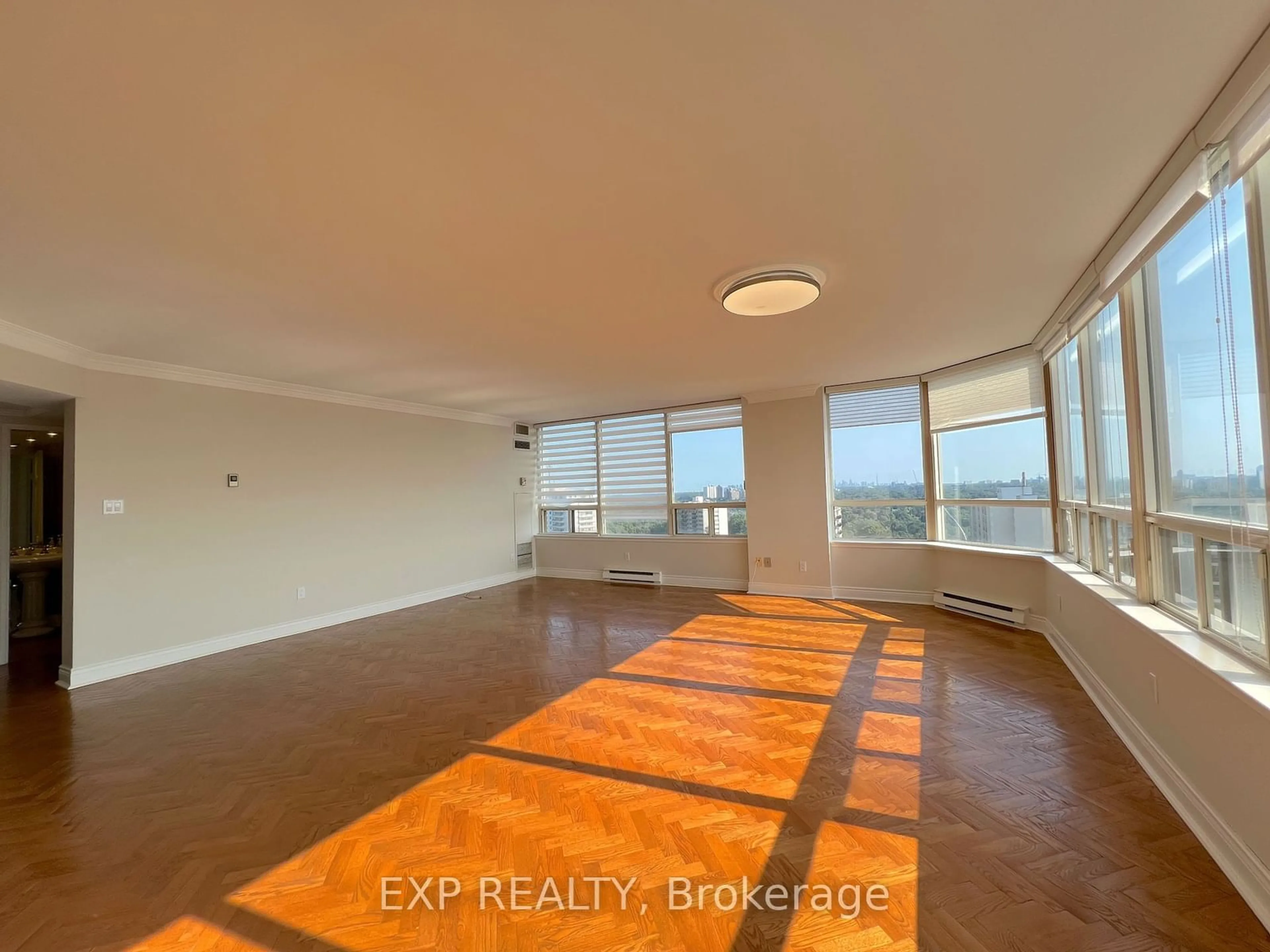 A pic of a room, wood floors for 10 Torresdale Ave #1704, Toronto Ontario M2R 3V8