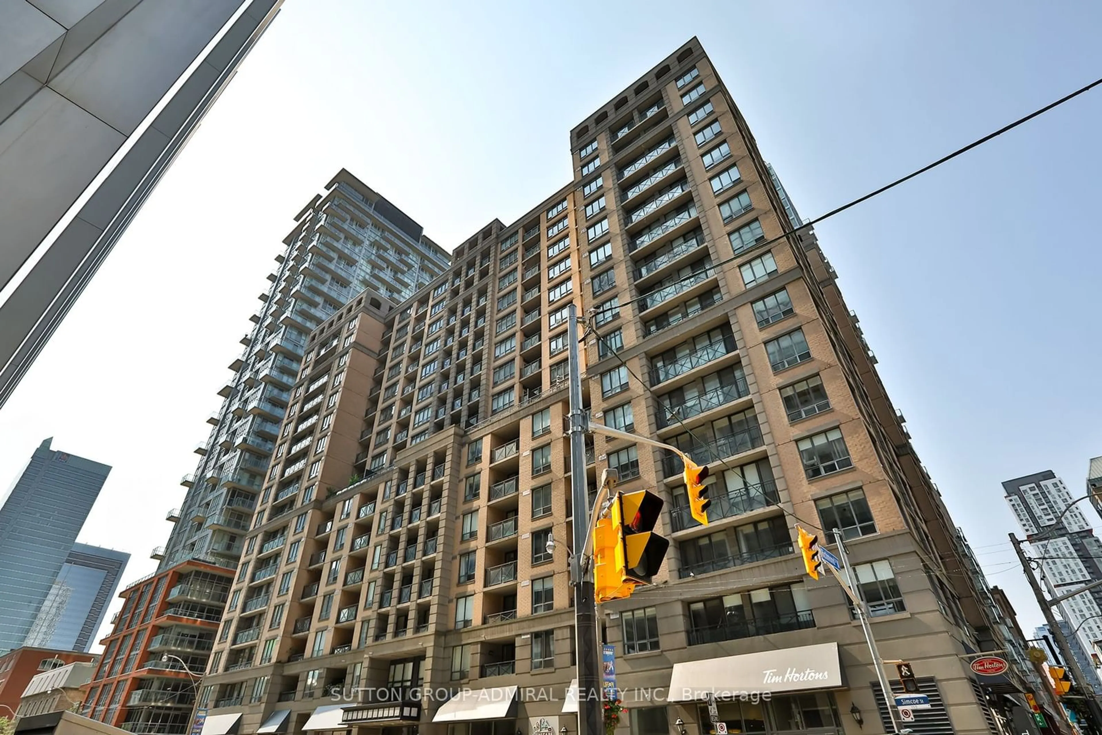 A pic from exterior of the house or condo for 140 Simcoe St #PH14, Toronto Ontario M5H 4E9