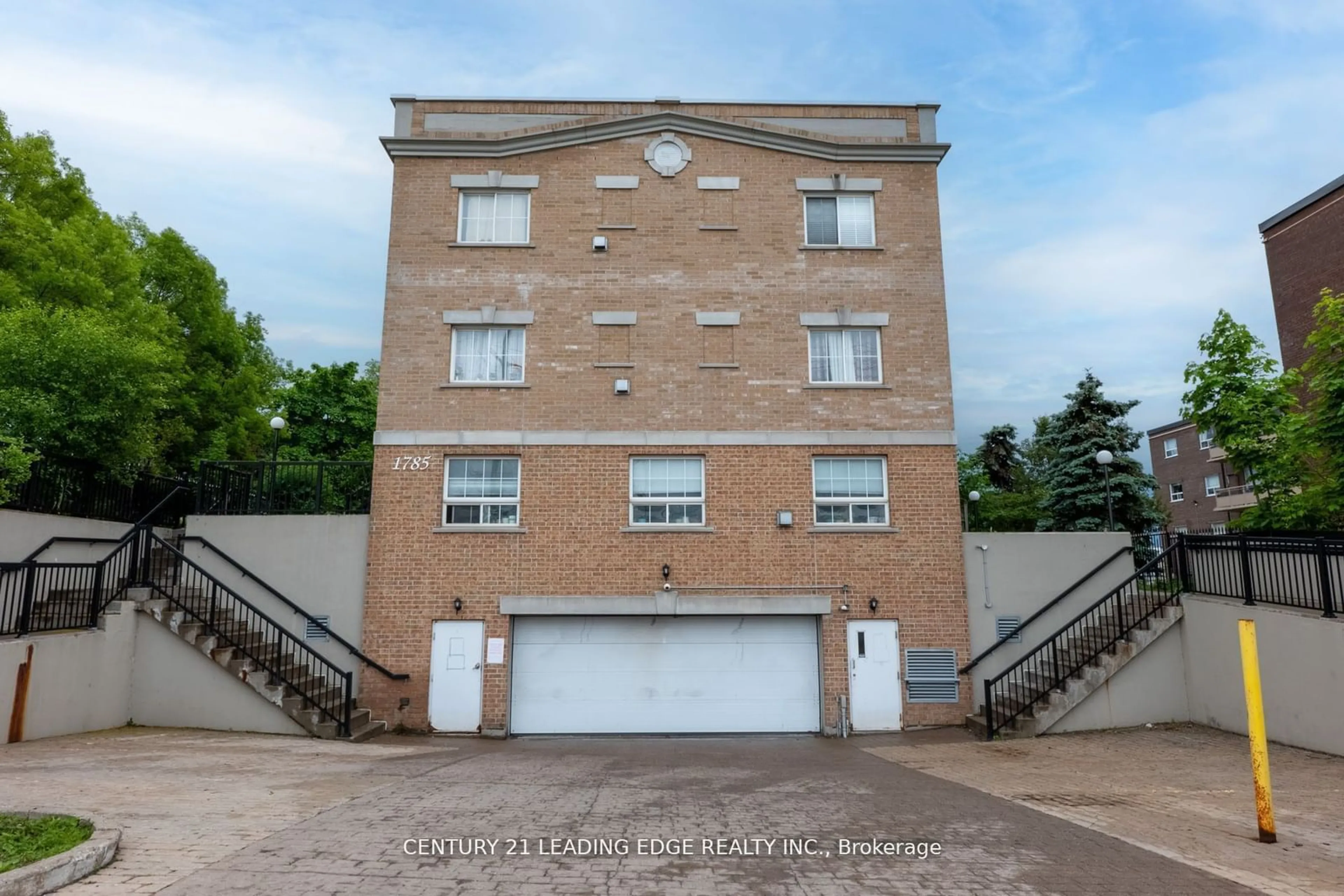 A pic from exterior of the house or condo, the front or back of building for 1785 Eglinton Ave #103, Toronto Ontario M4A 2Y6