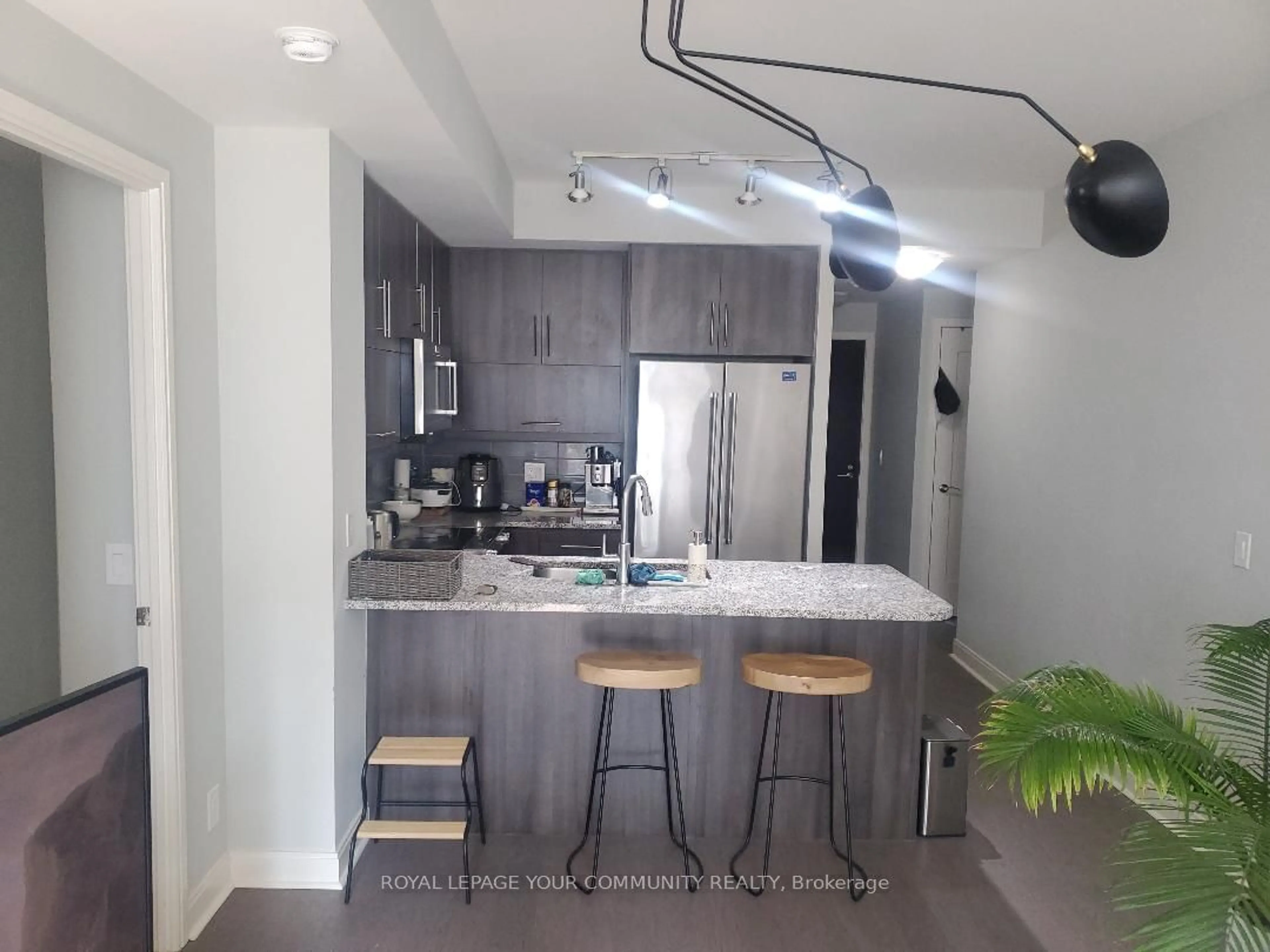 Open concept kitchen for 825 Church St #820, Toronto Ontario M4W 3Z4