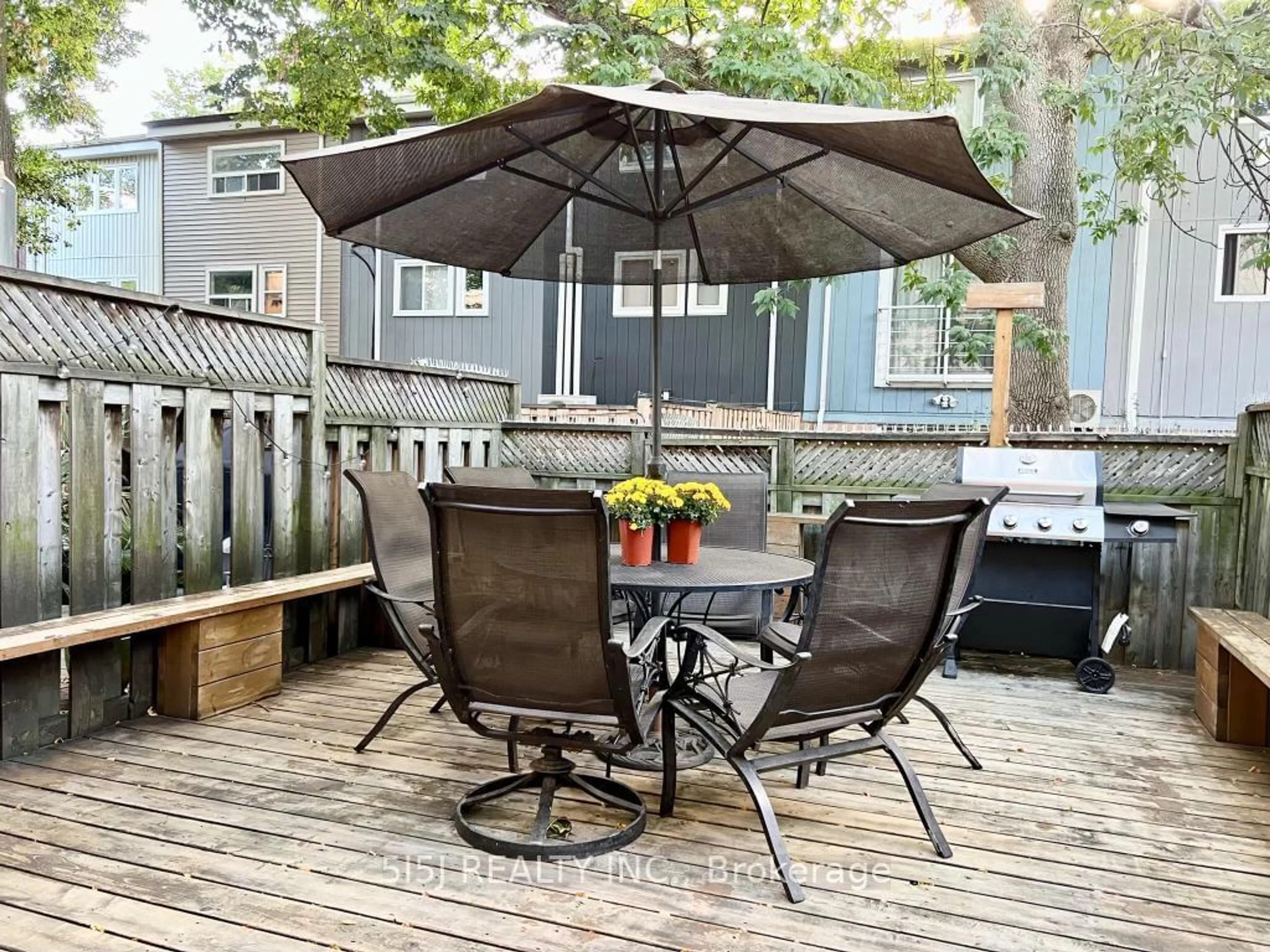 Patio, the fenced backyard for 252 Milan St, Toronto Ontario M5A 3Z6