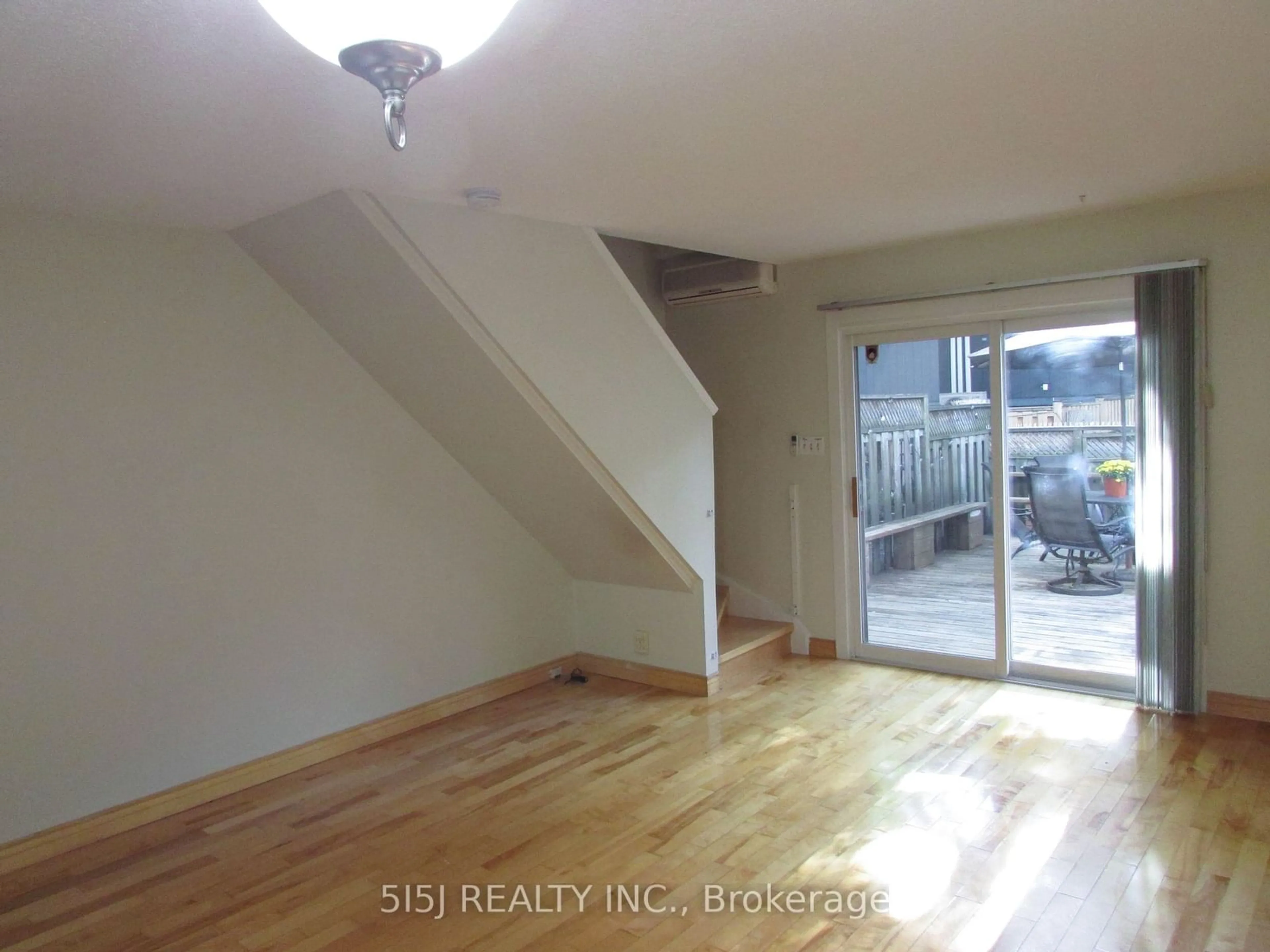 A pic of a room, wood floors for 252 Milan St, Toronto Ontario M5A 3Z6