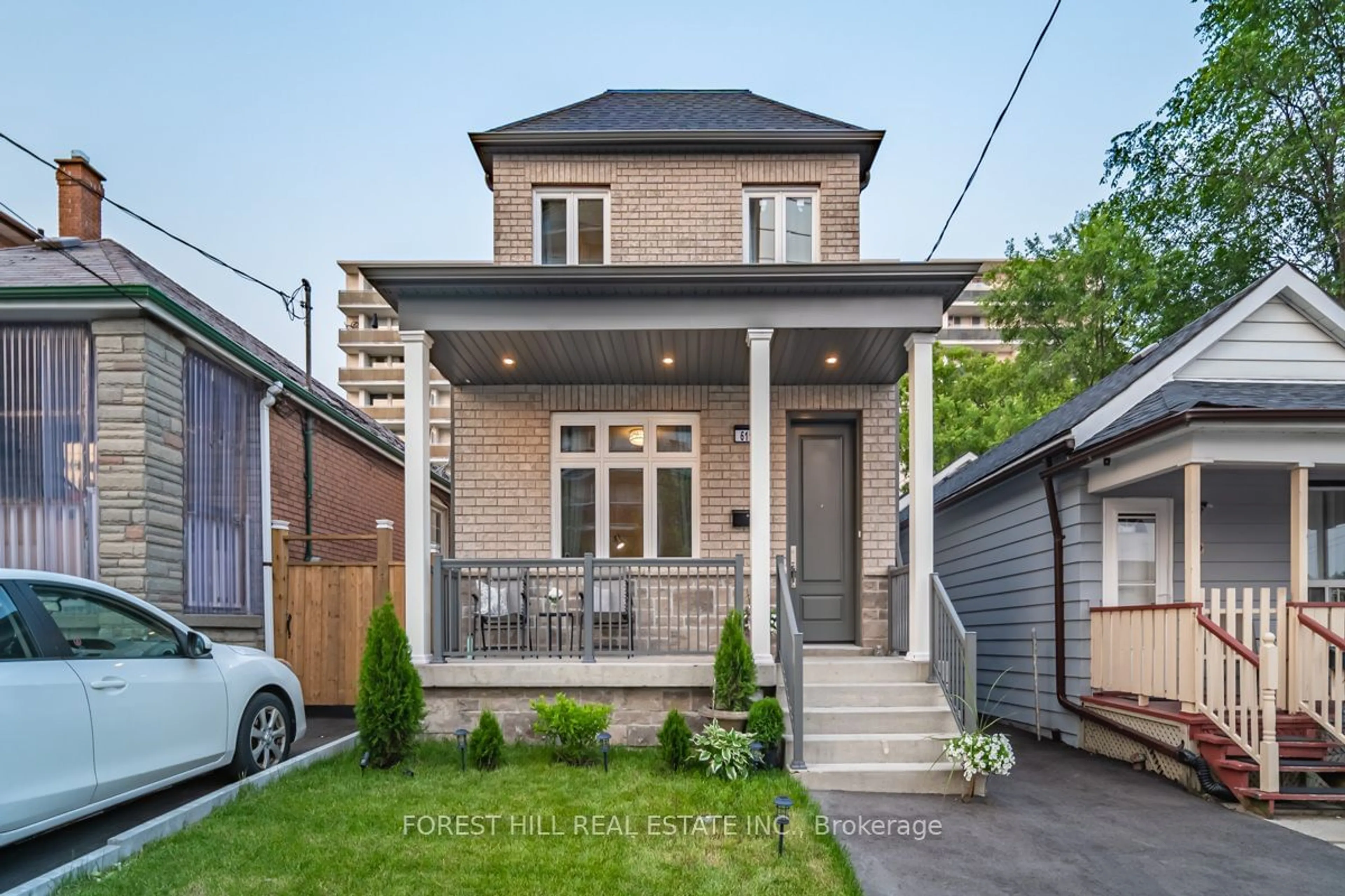 Frontside or backside of a home, the fenced backyard for 611 Northcliffe Blvd, Toronto Ontario M6E 3L8